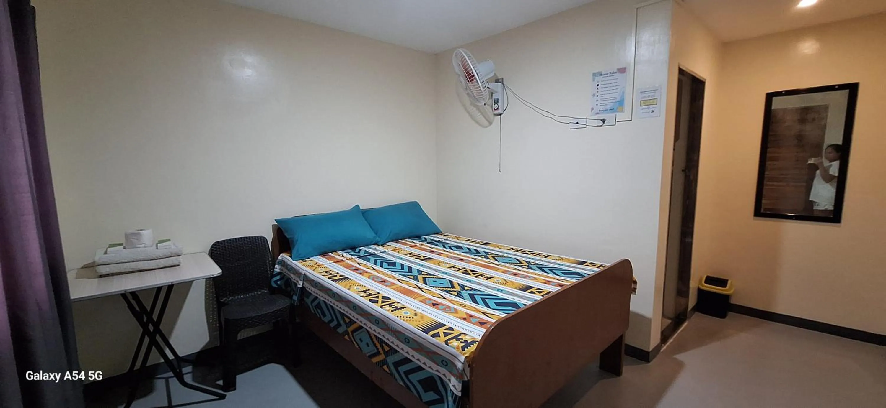 Bed in Rain Haven Lodging House