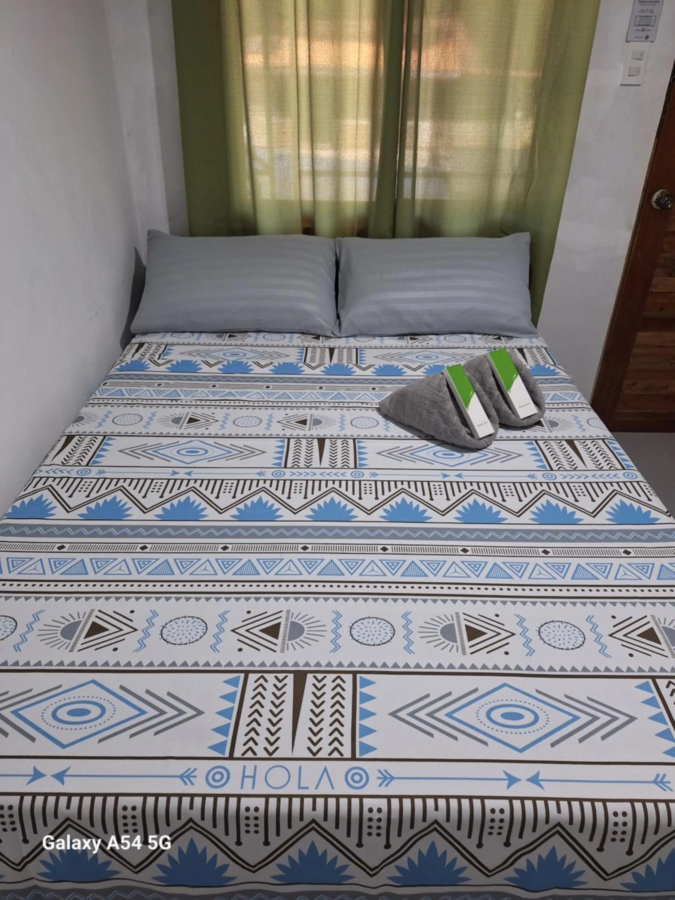 Bed in Rain Haven Lodging House