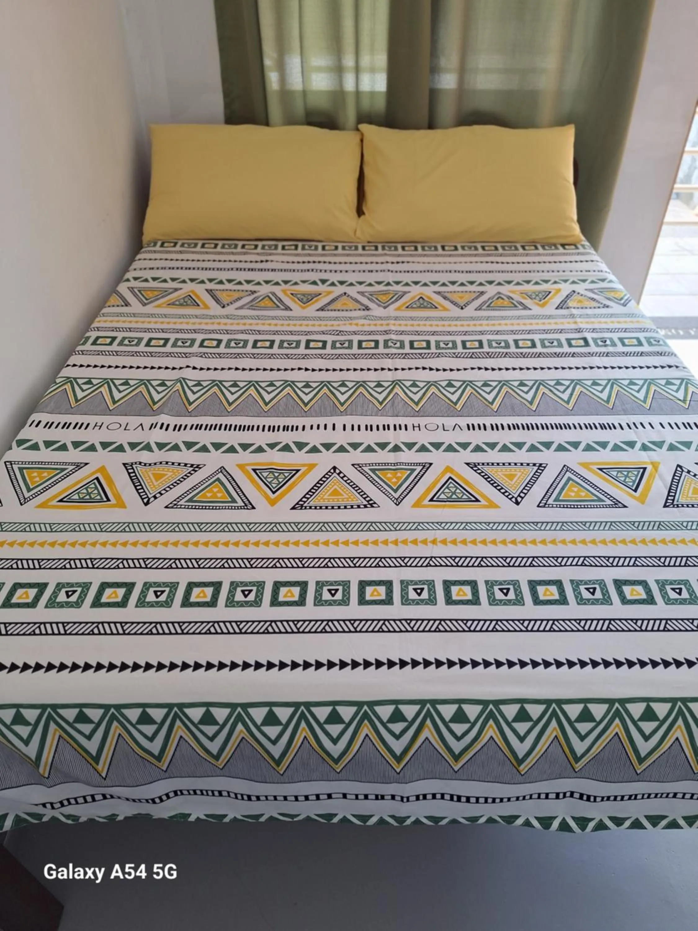 Bed in Rain Haven Lodging House