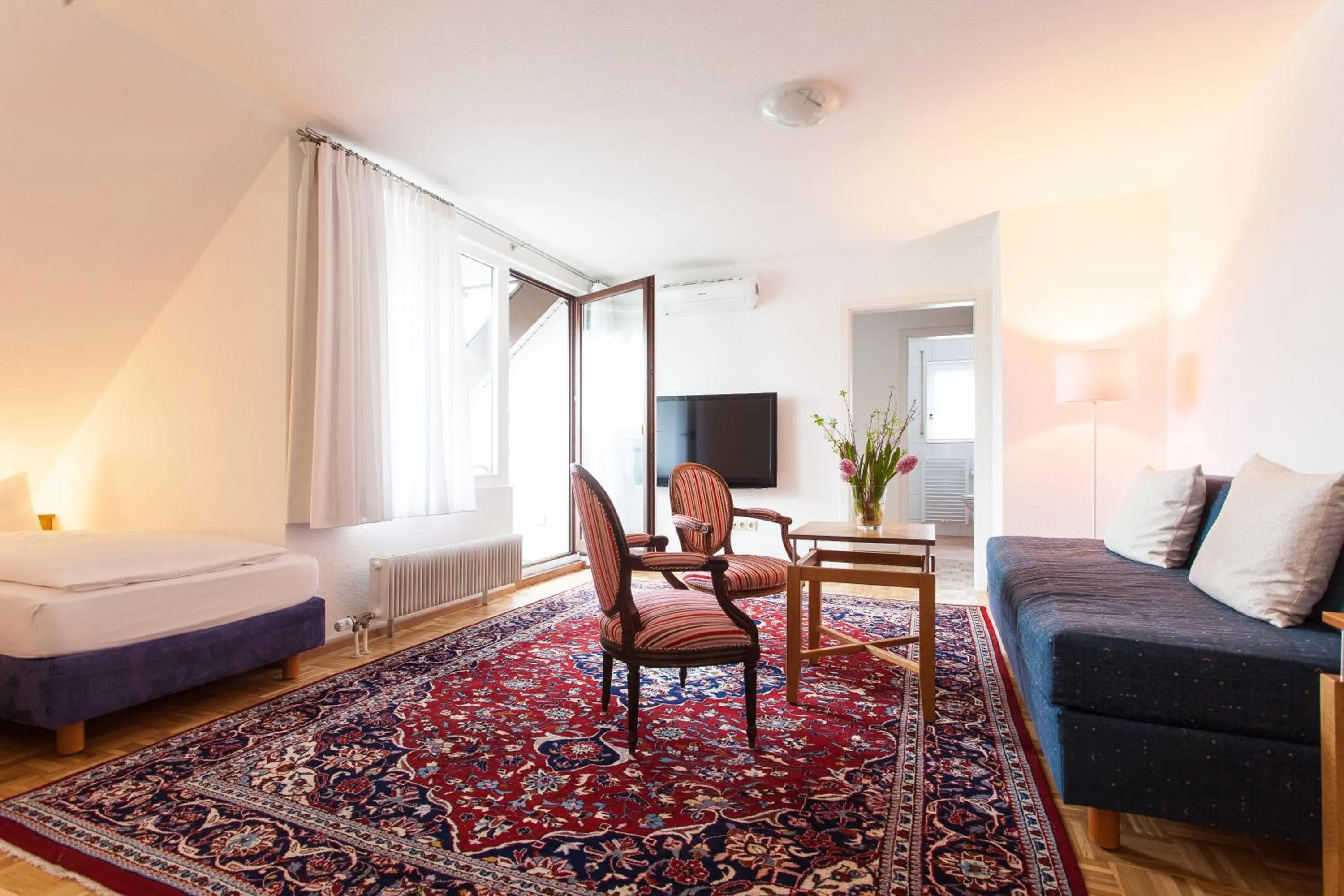 Living room, Bed in Hotel garni Schacherer