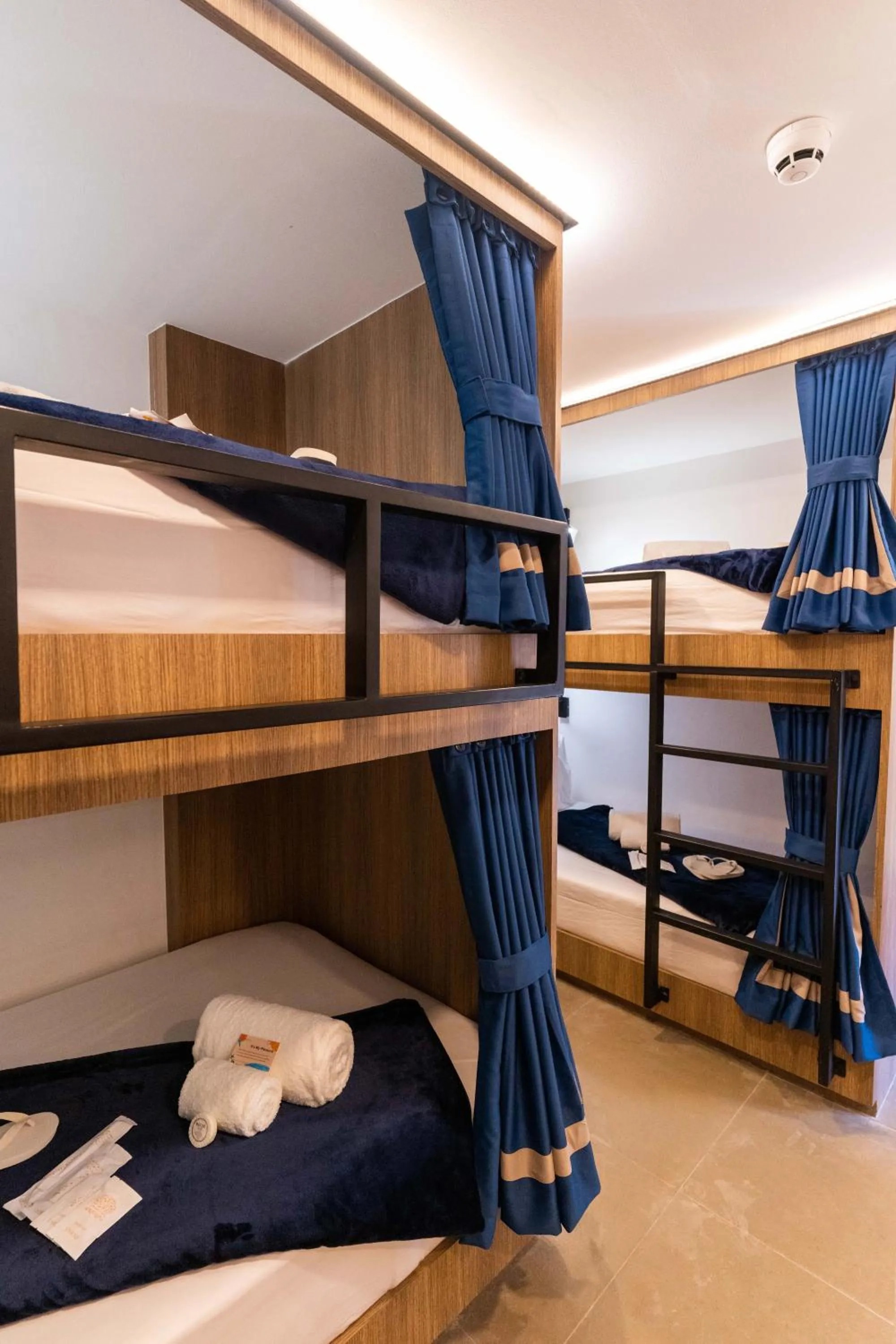 Bed in UNWND Boutique Hotel Makati