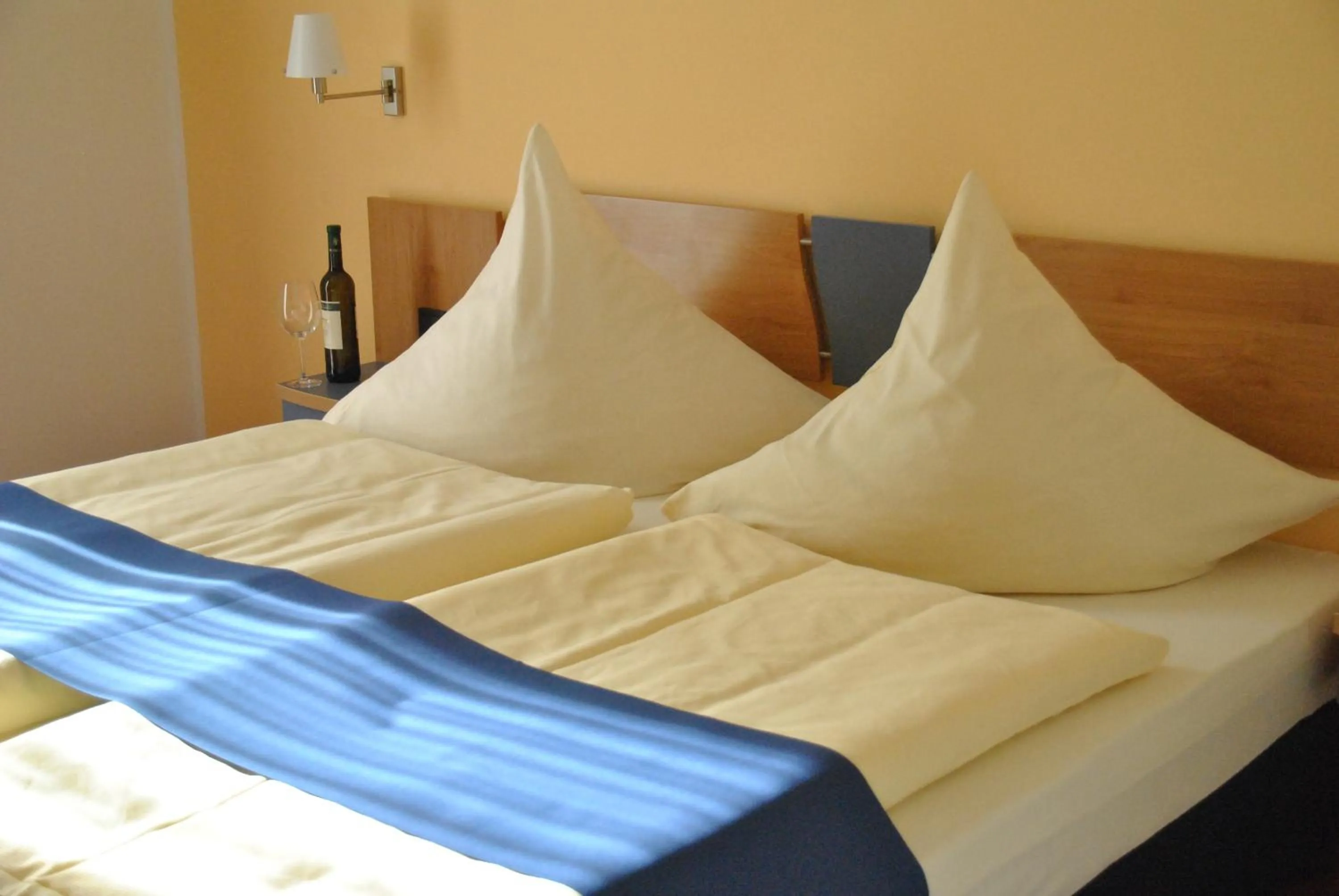 Bed in Hotel Ambiente
