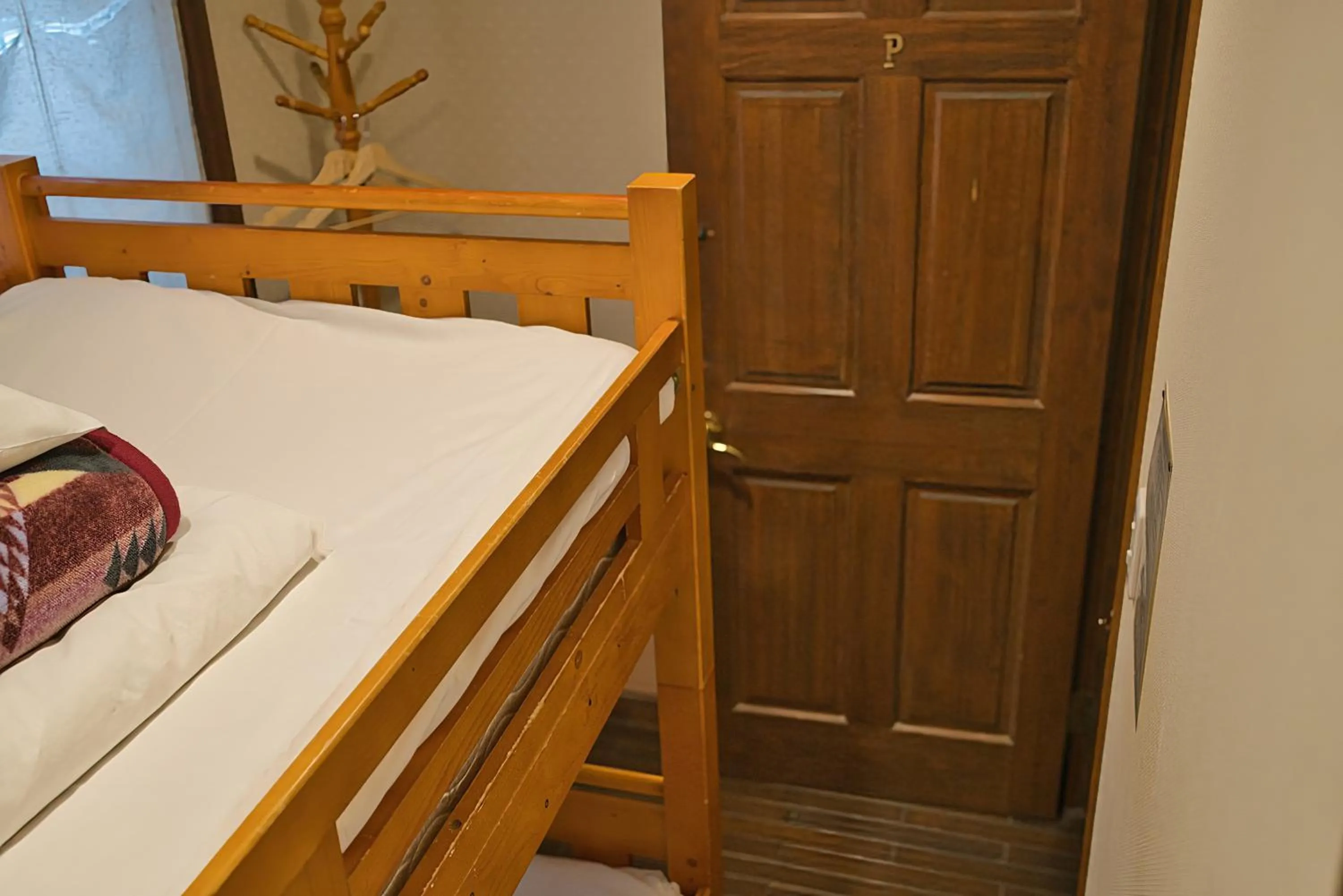 Photo of the whole room, Bed in IZA Kamakura Guest House and Bar