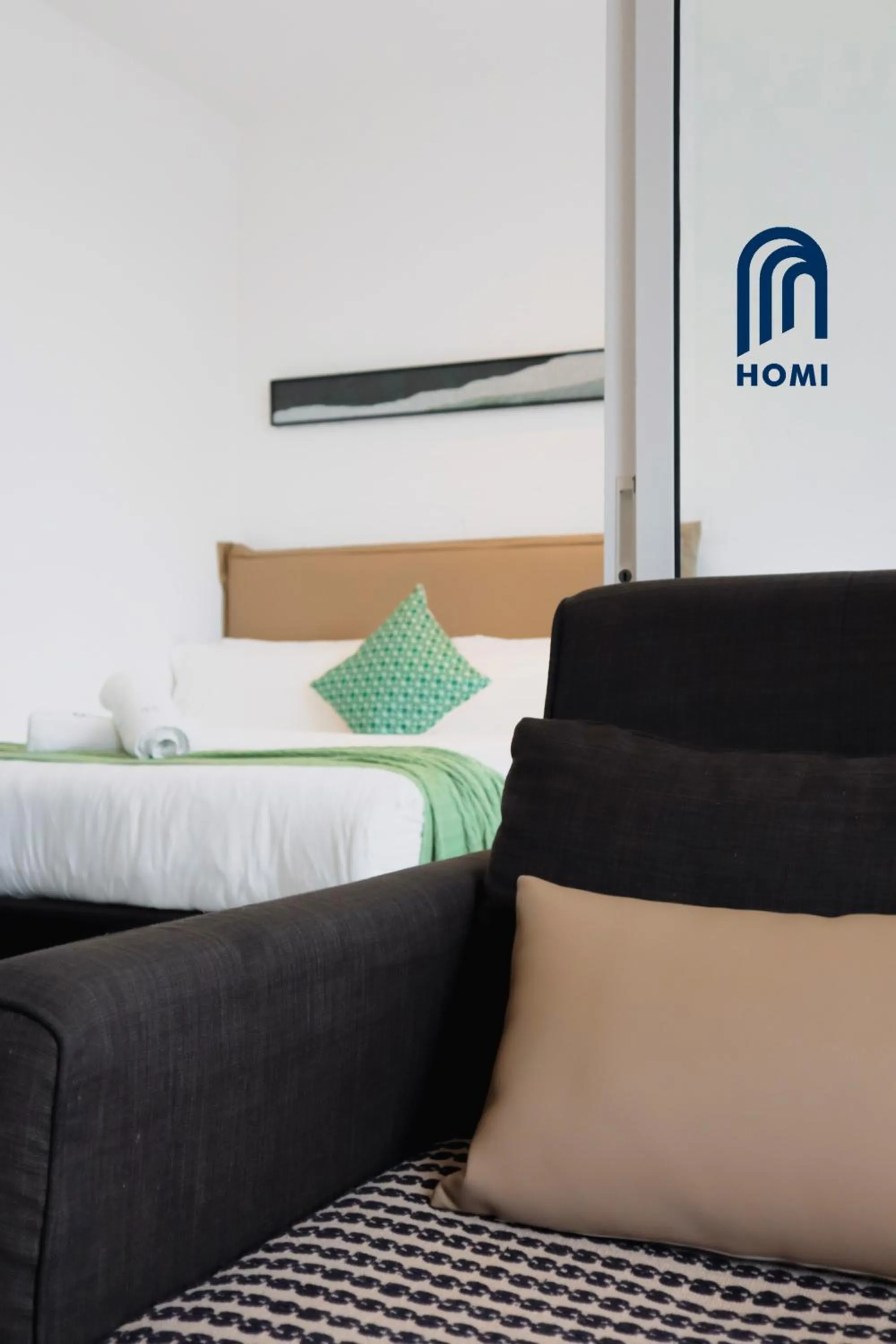 Photo of the whole room, Bed in Homi Oasis at KK Times Square 和逸绿洲