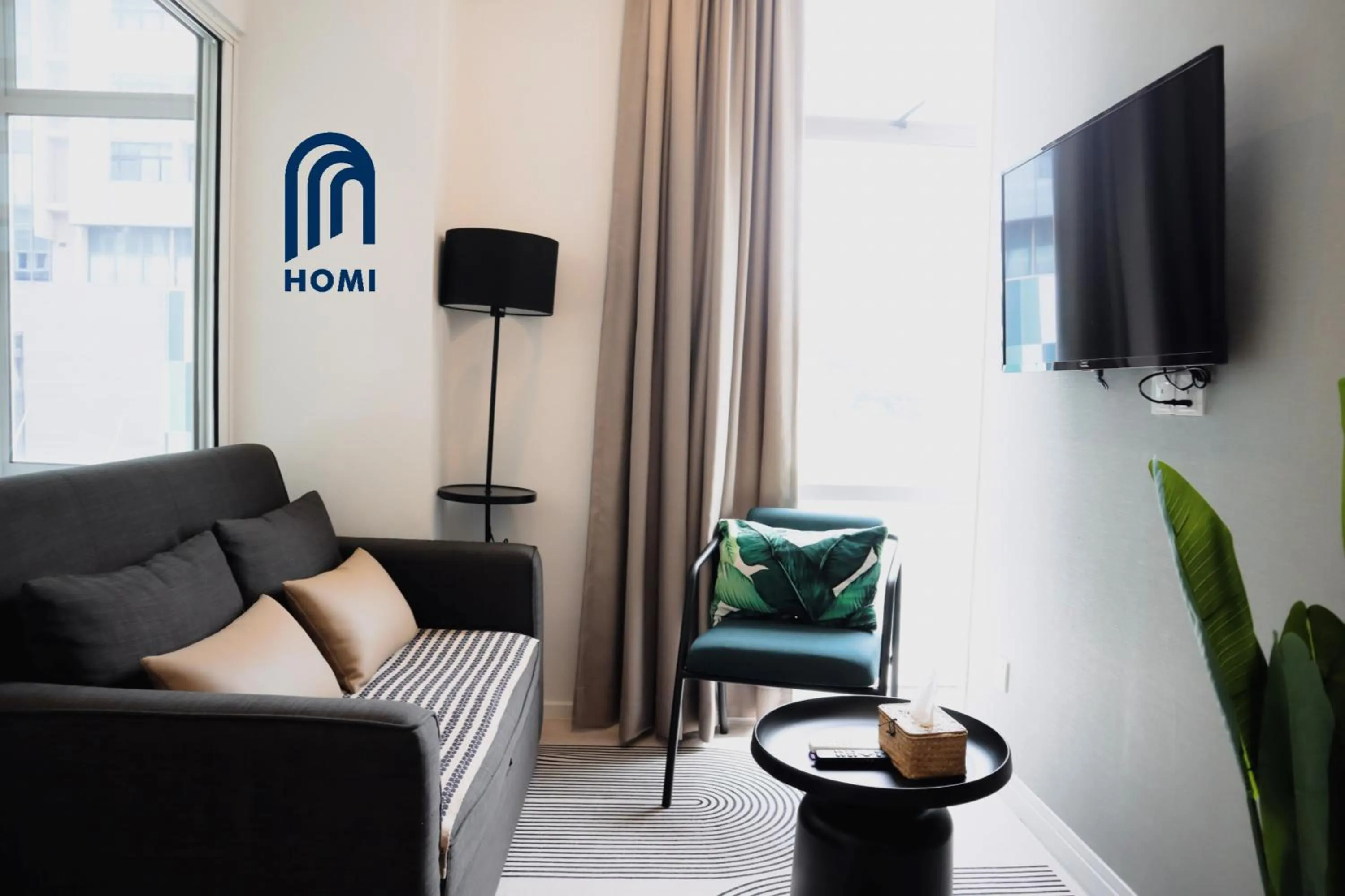 TV and multimedia in Homi Oasis at KK Times Square 和逸绿洲