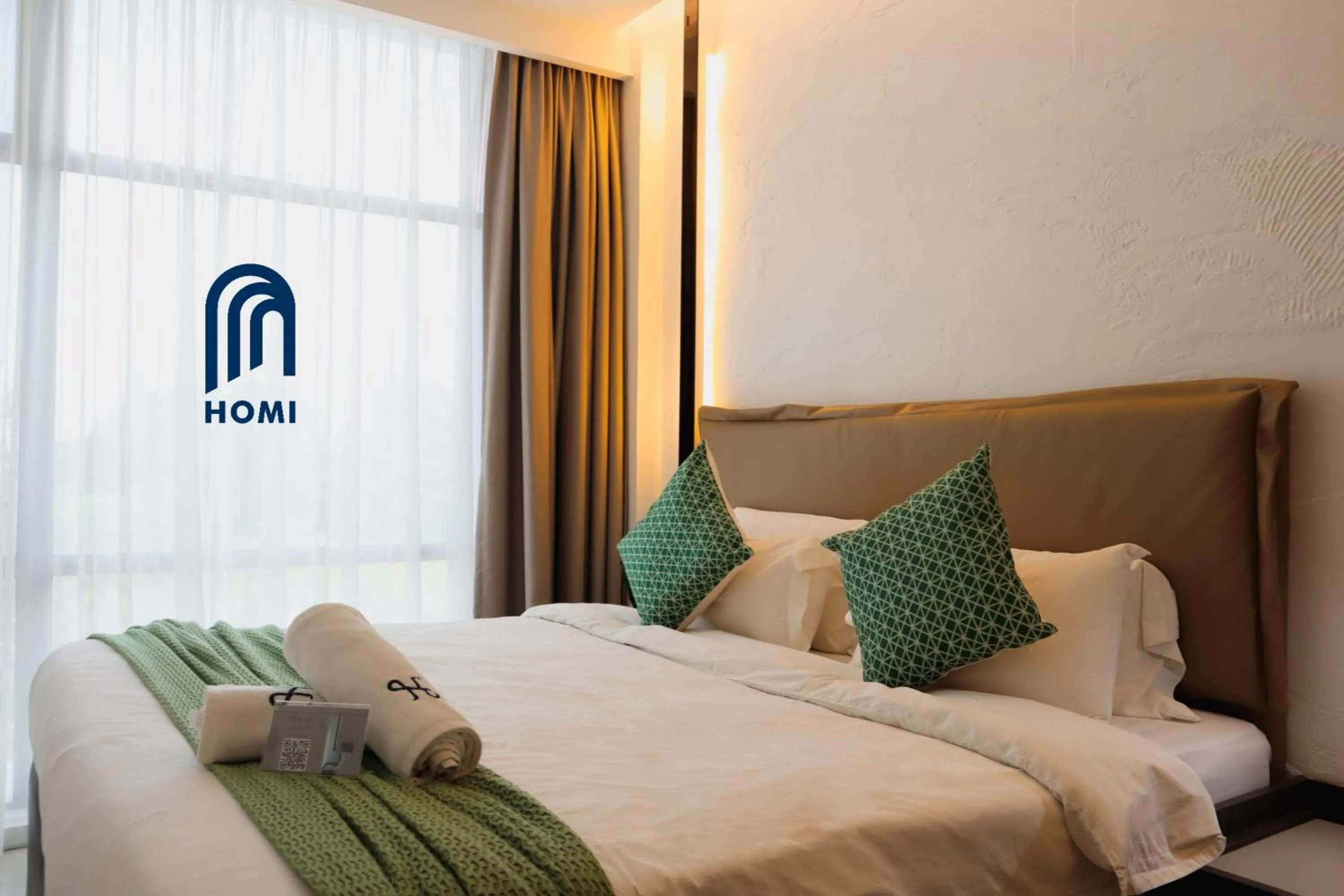 Photo of the whole room, Bed in Homi Oasis at KK Times Square 和逸绿洲