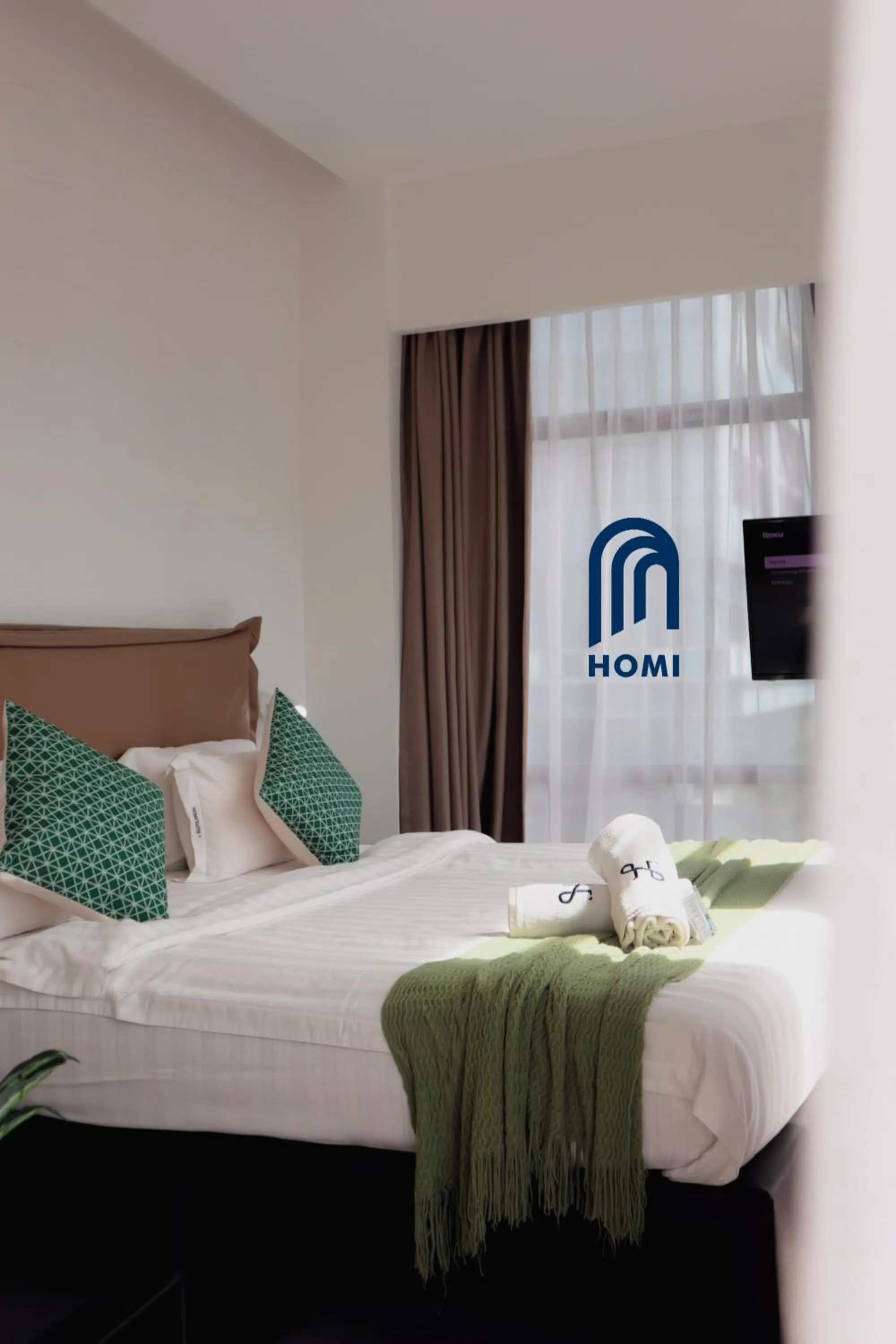 TV and multimedia, Bed in Homi Oasis at KK Times Square 和逸绿洲