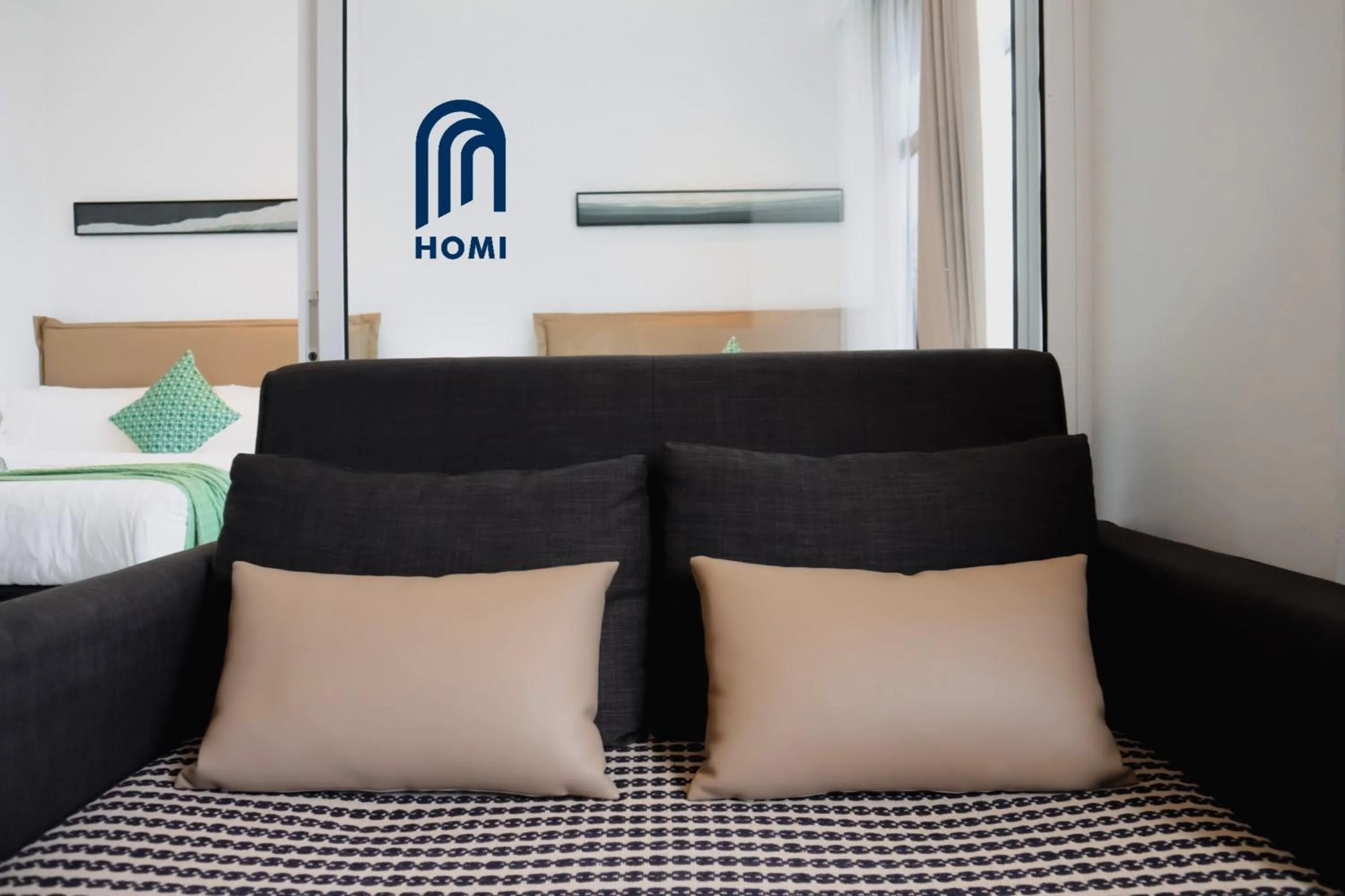 Photo of the whole room, Bed in Homi Oasis at KK Times Square 和逸绿洲