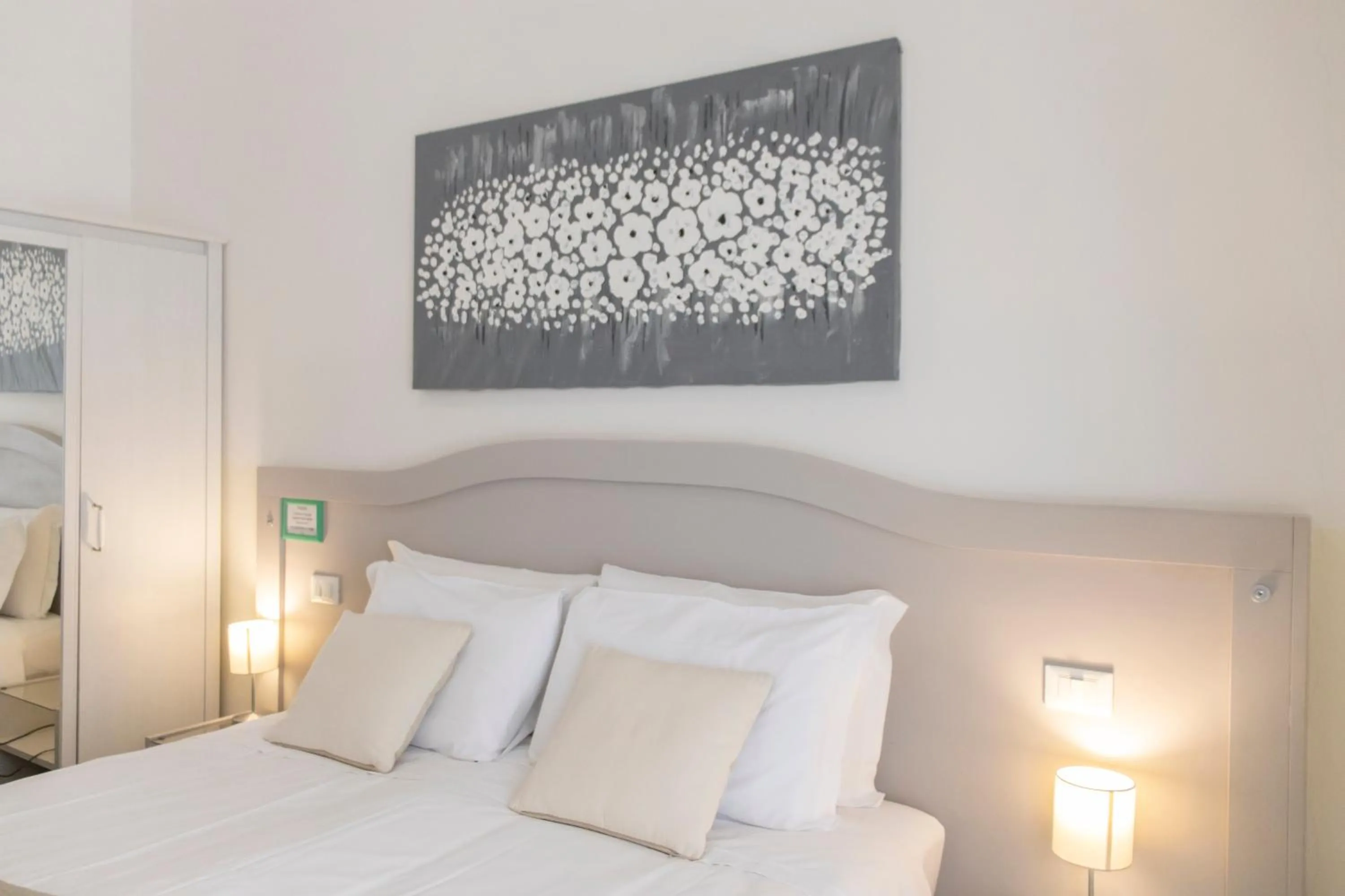 Decorative detail, Bed in Biancorèroma B&B