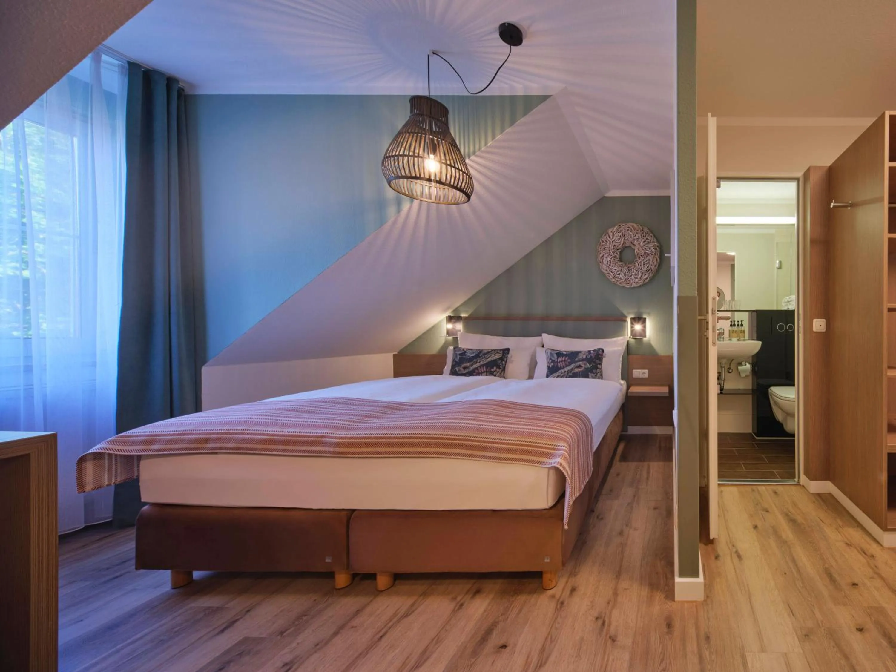 Bed in Classik Hotel Martinshof, Messe München