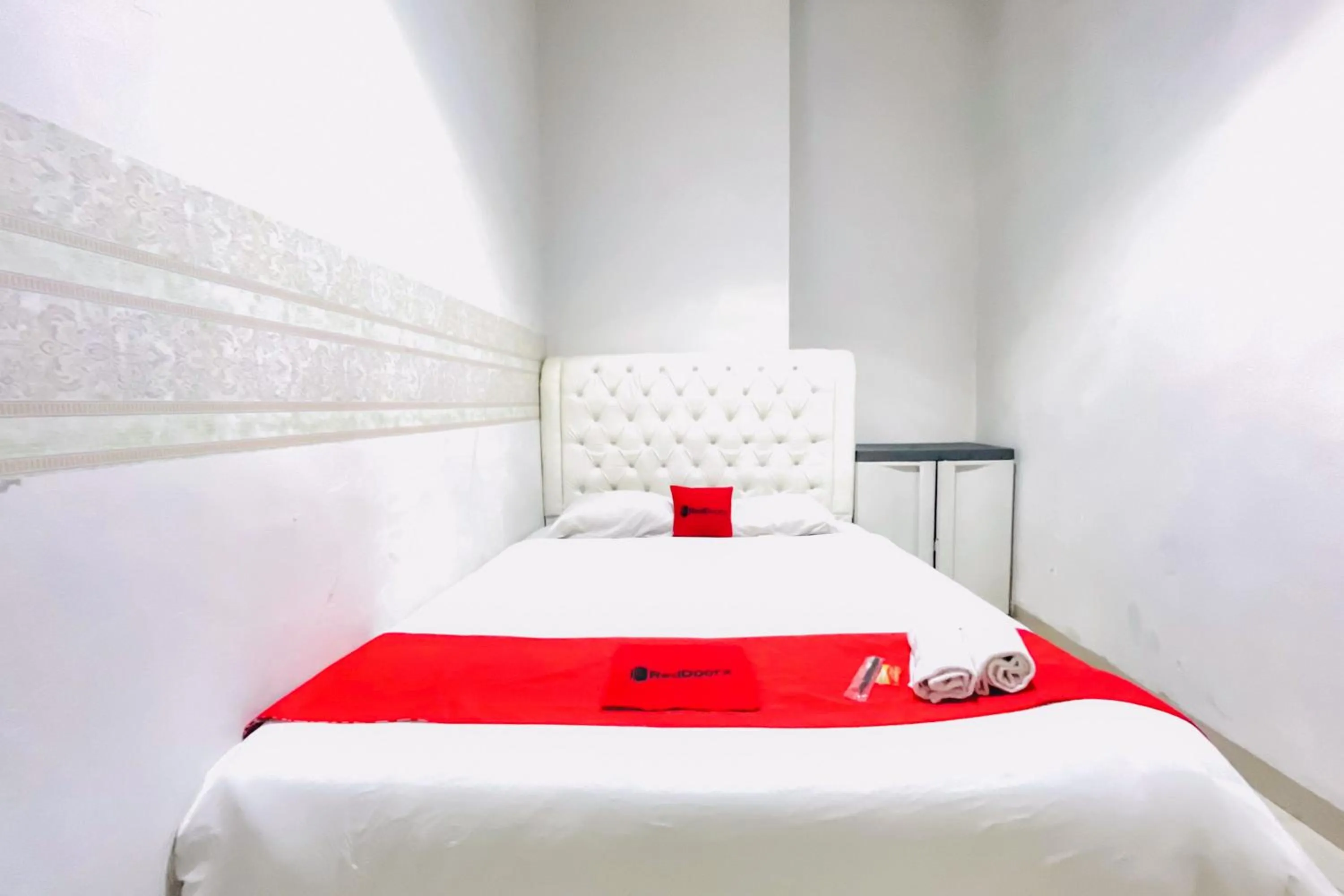 Bedroom, Bed in RedDoorz at STM Suite Medan Amplas