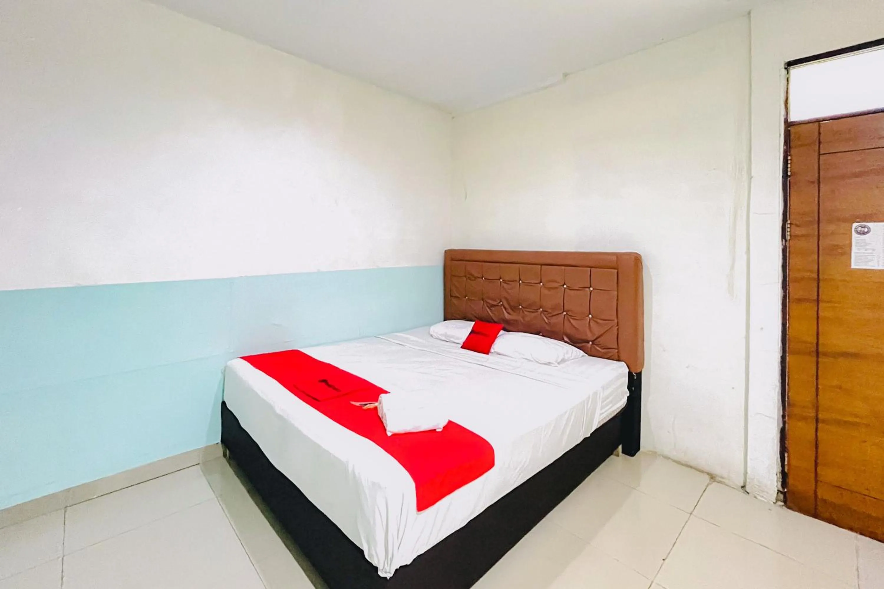 Bedroom, Bed in RedDoorz at STM Suite Medan Amplas