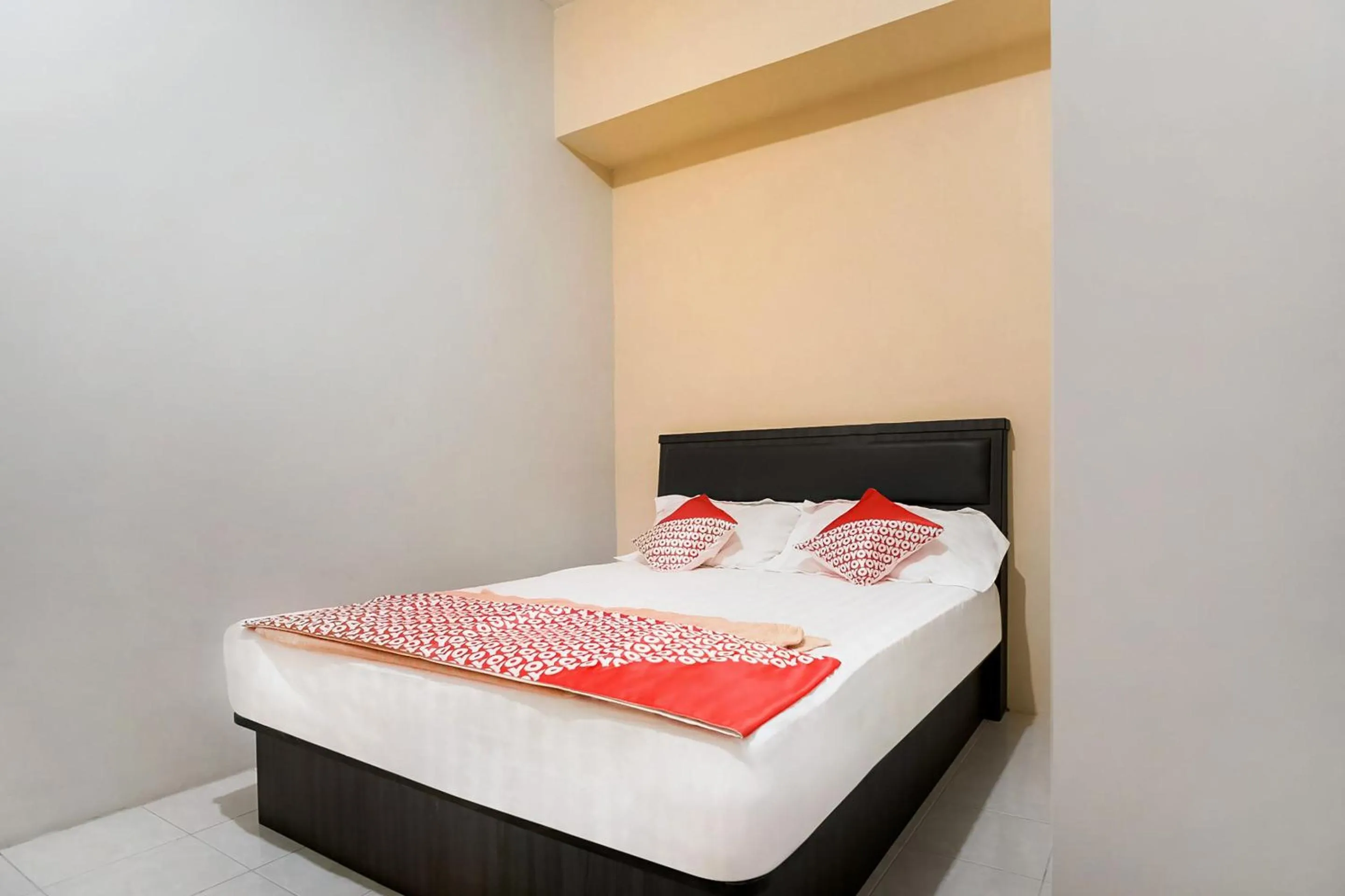 Bedroom in OYO 3212 Coffee Jodoh Homestay