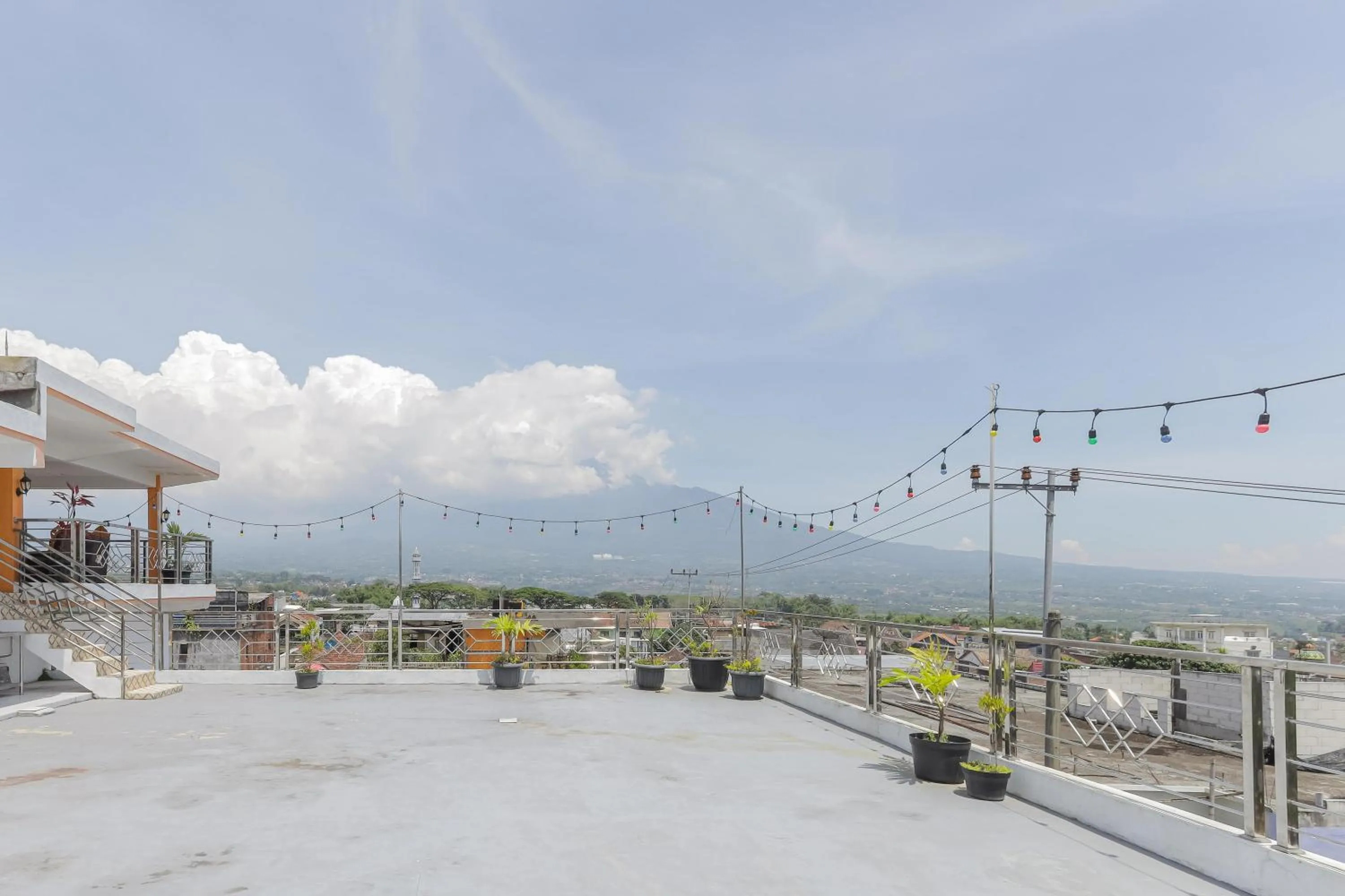 Balcony/Terrace in Urbanview Hotel Near Jatim Park 3 by RedDoorz