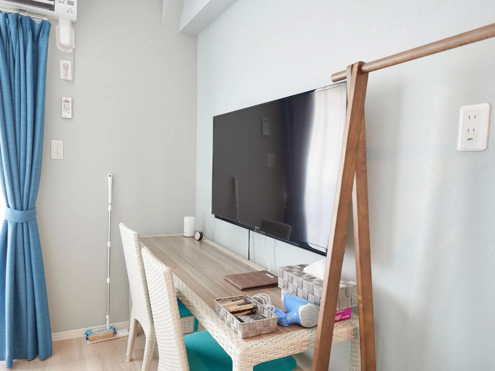 Photo of the whole room, TV/Entertainment Center in Tenpoint Hotel OKOU