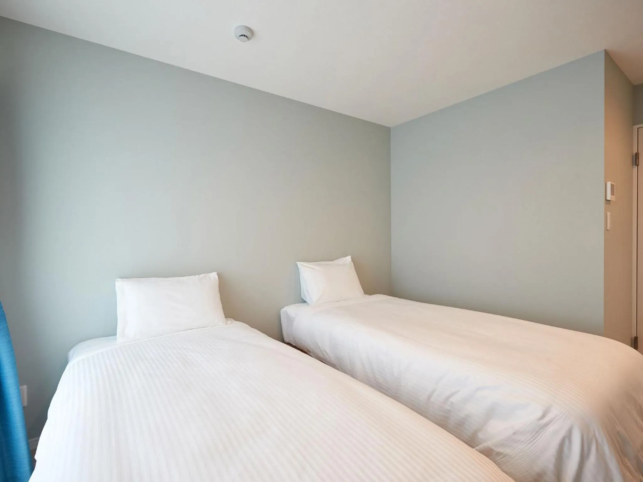 Photo of the whole room, Bed in Tenpoint Hotel OKOU