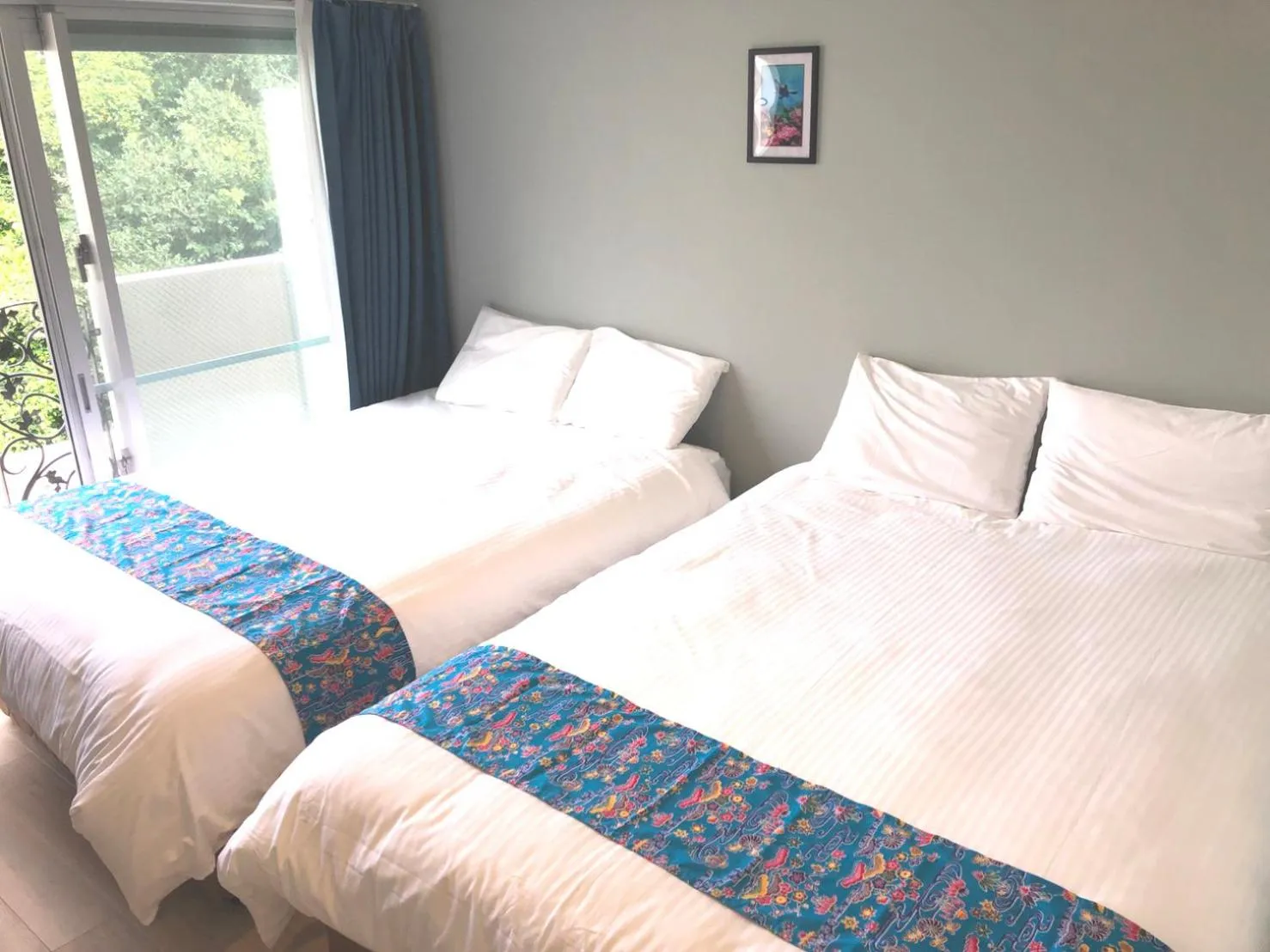 Bed in Tenpoint Hotel OKOU