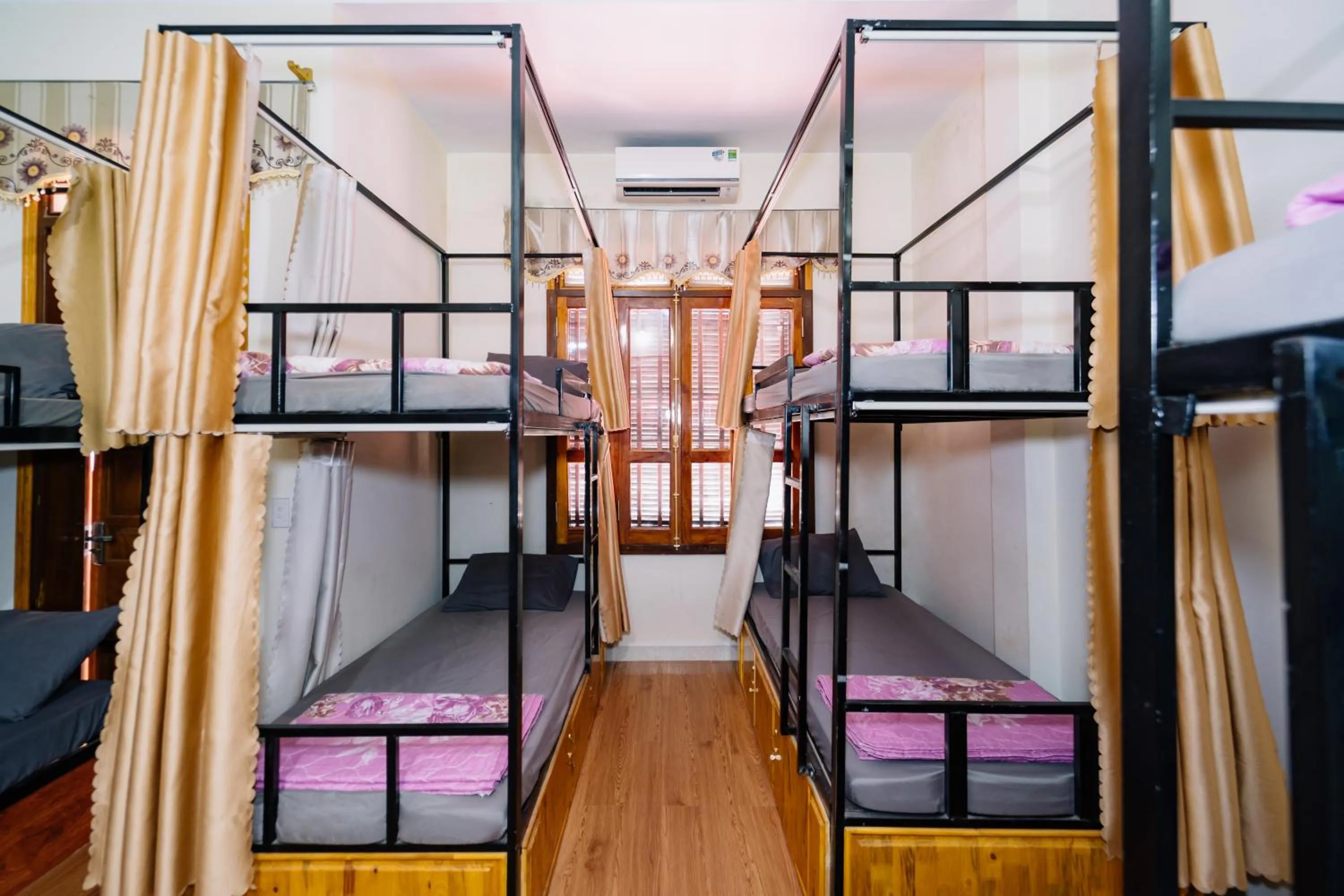 Bed in HG Hostel provide Tours & Motorbikes