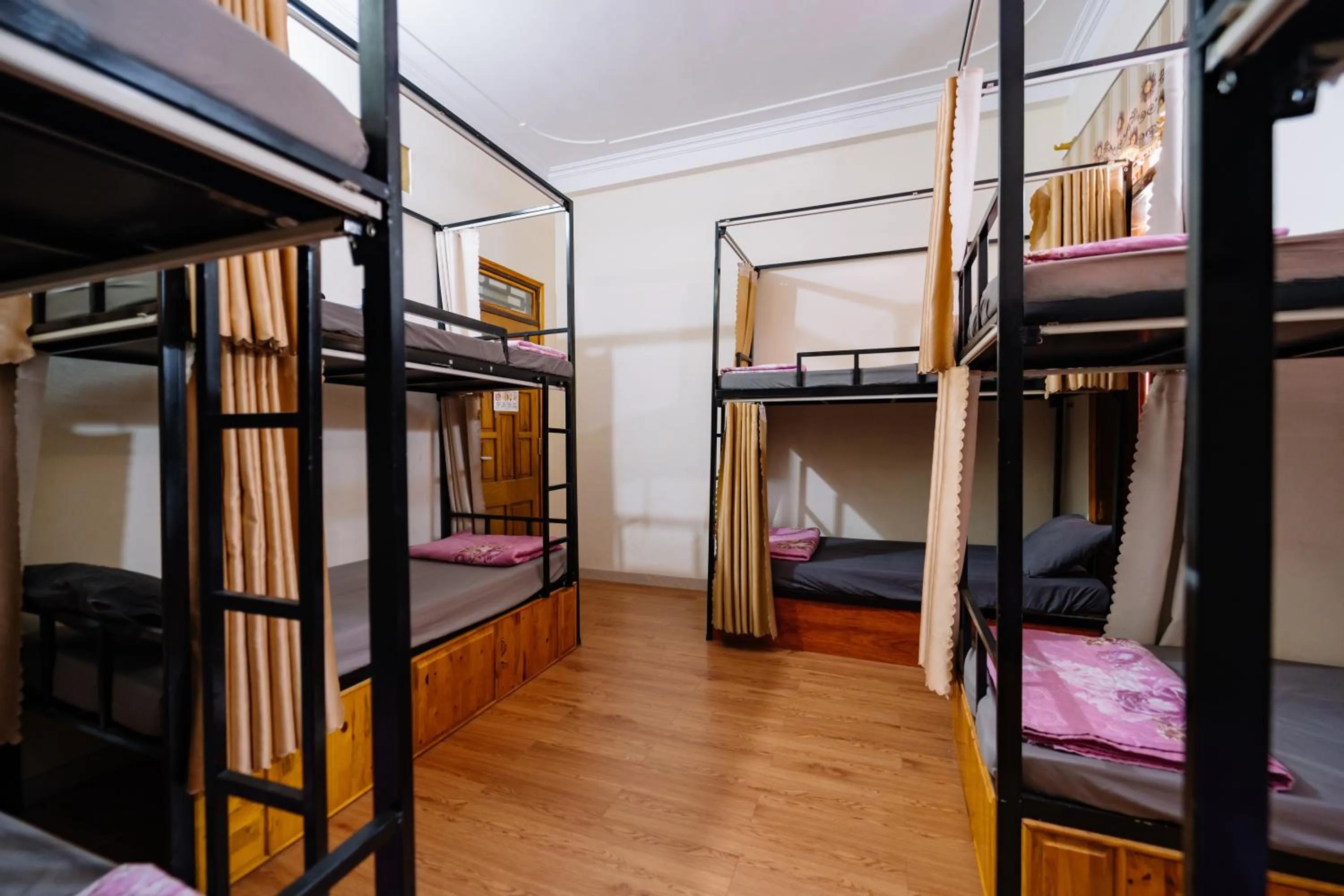 Photo of the whole room, Bed in HG Hostel provide Tours & Motorbikes