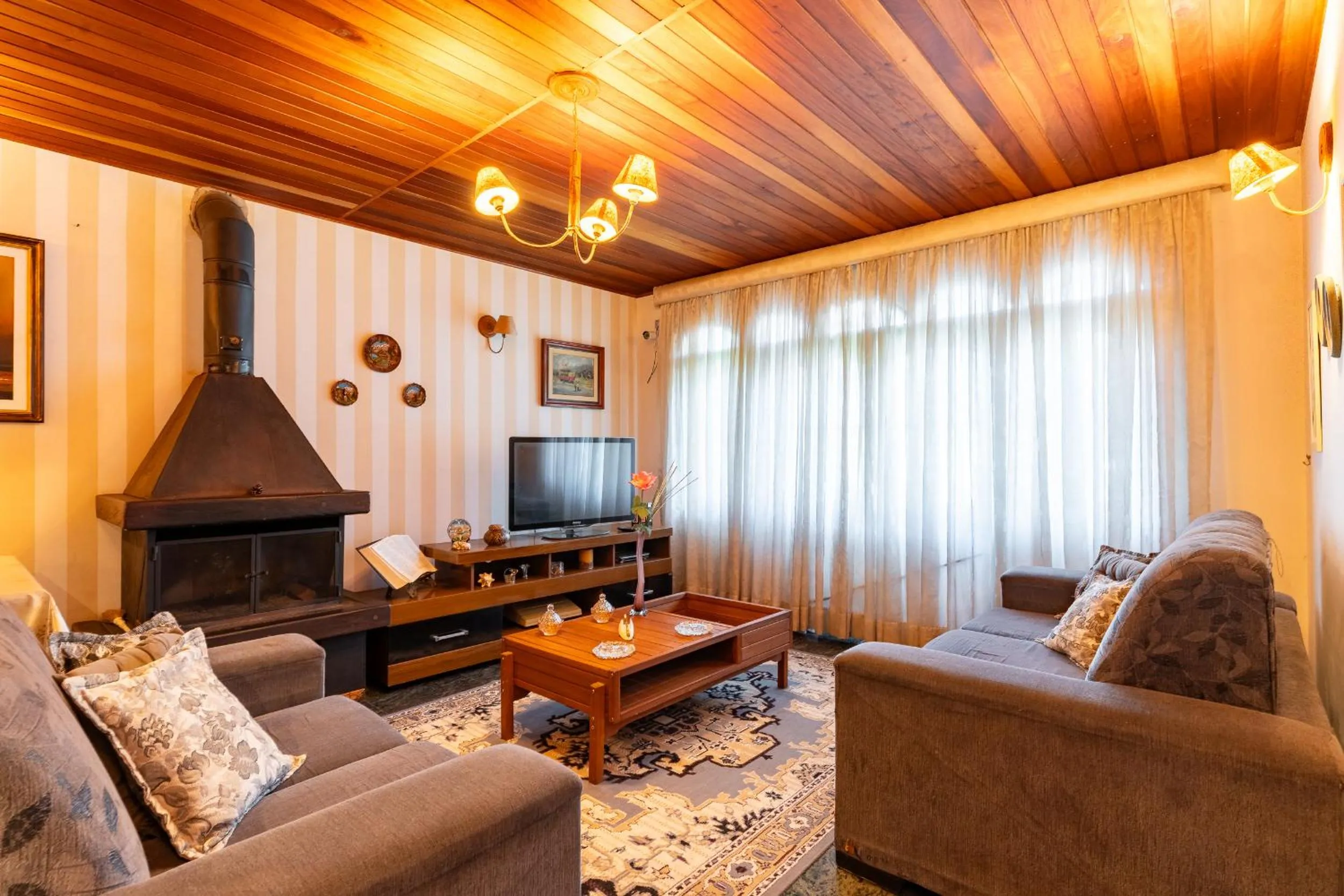 Communal lounge/ TV room in Pousada Recanto Sião