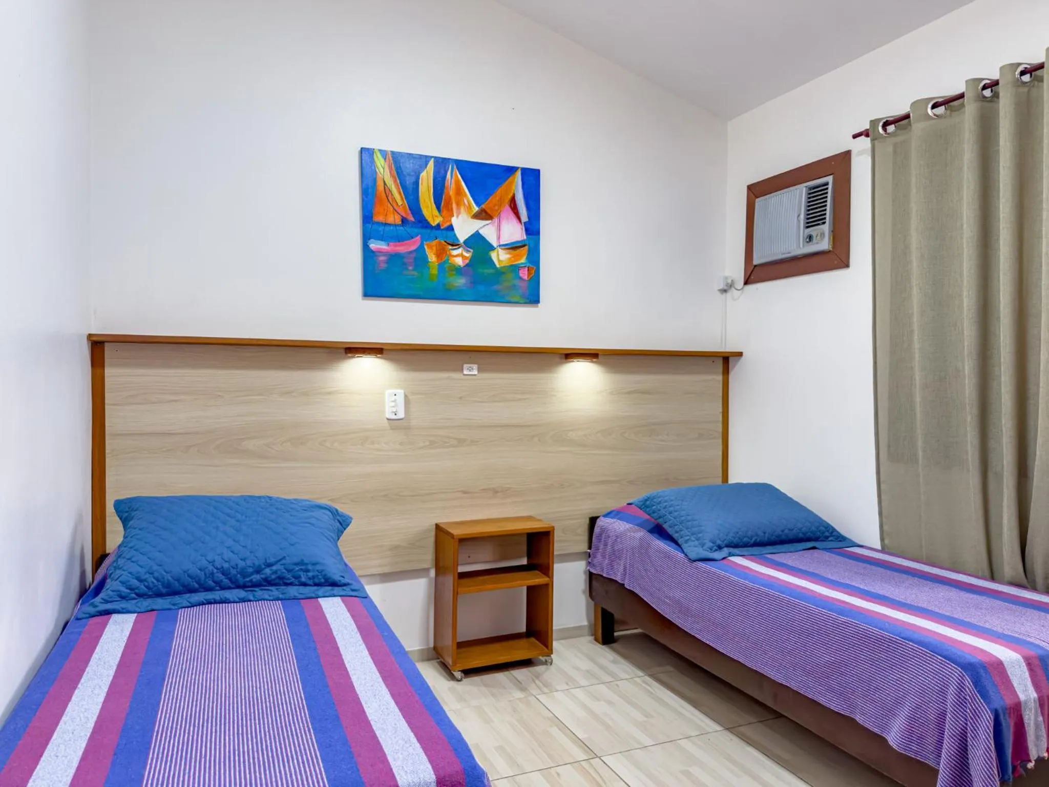 Bed in Lemuria Apart Hotel