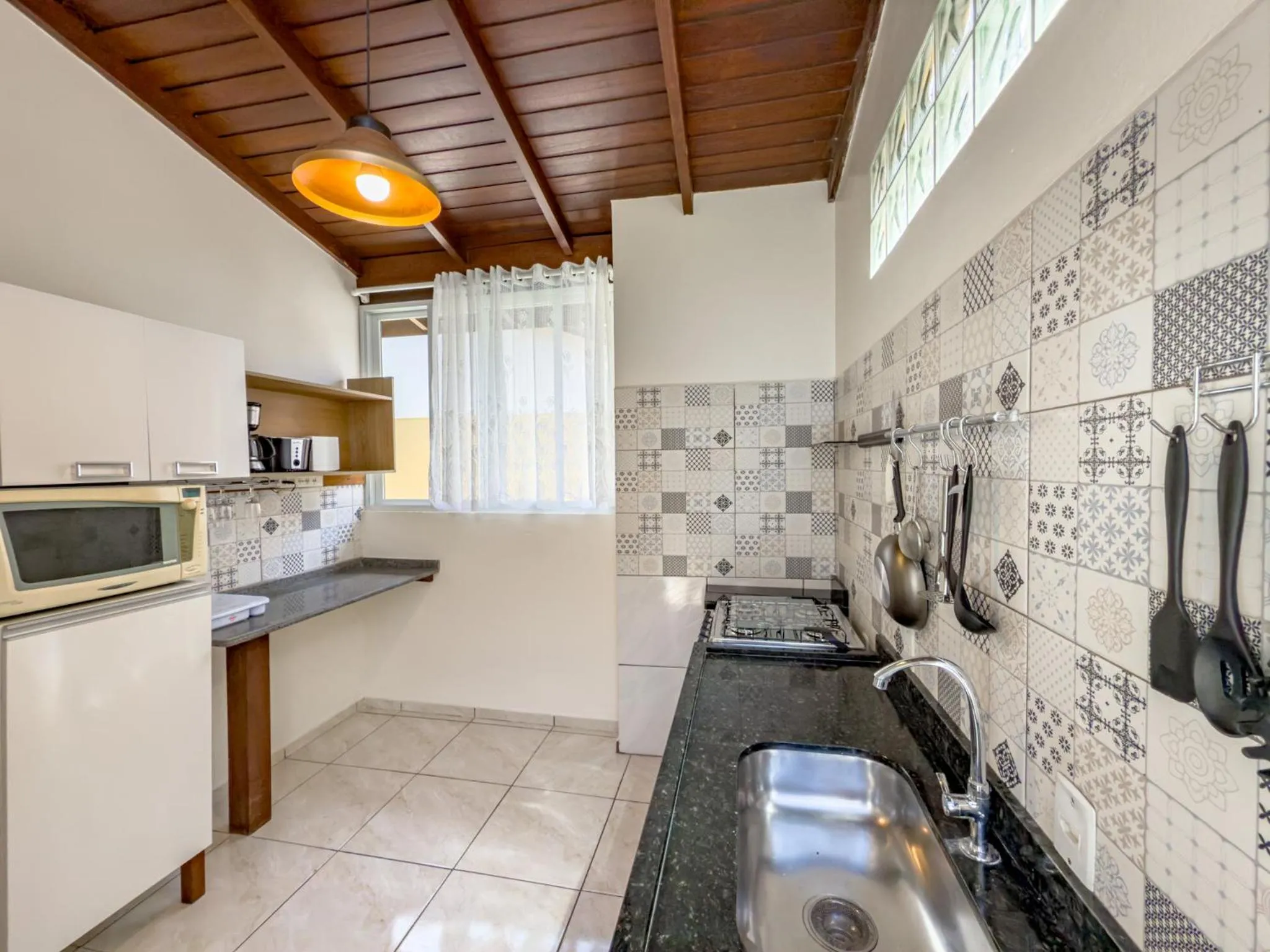 Kitchen or kitchenette in Lemuria Apart Hotel