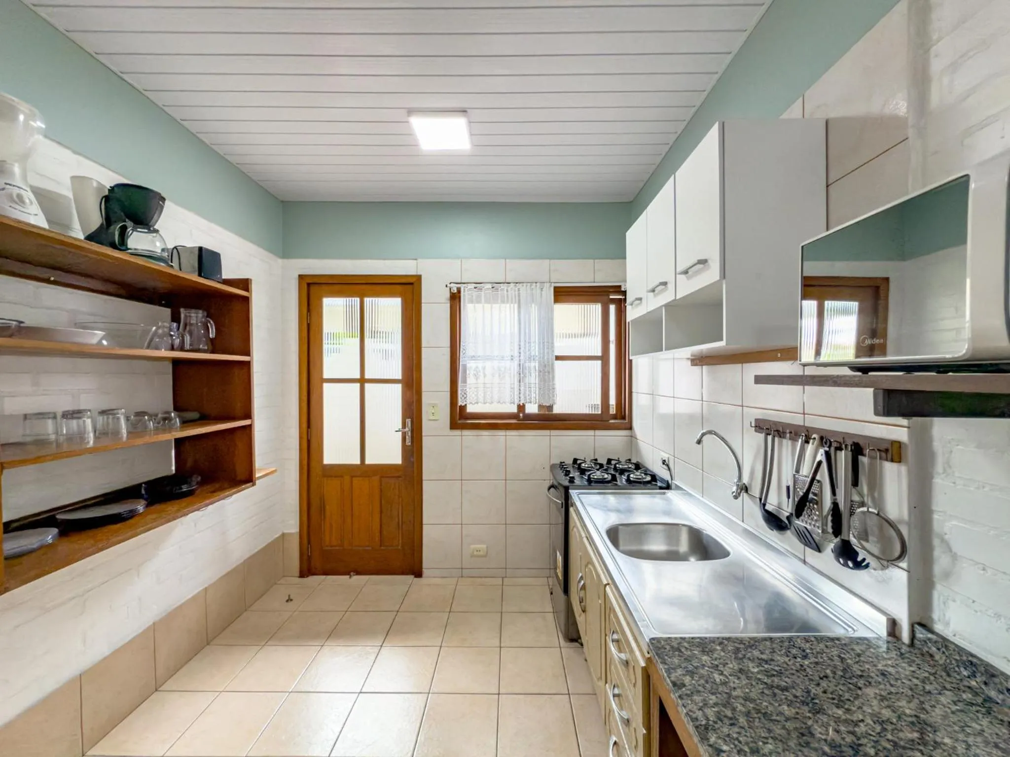 Kitchen or kitchenette in Lemuria Apart Hotel
