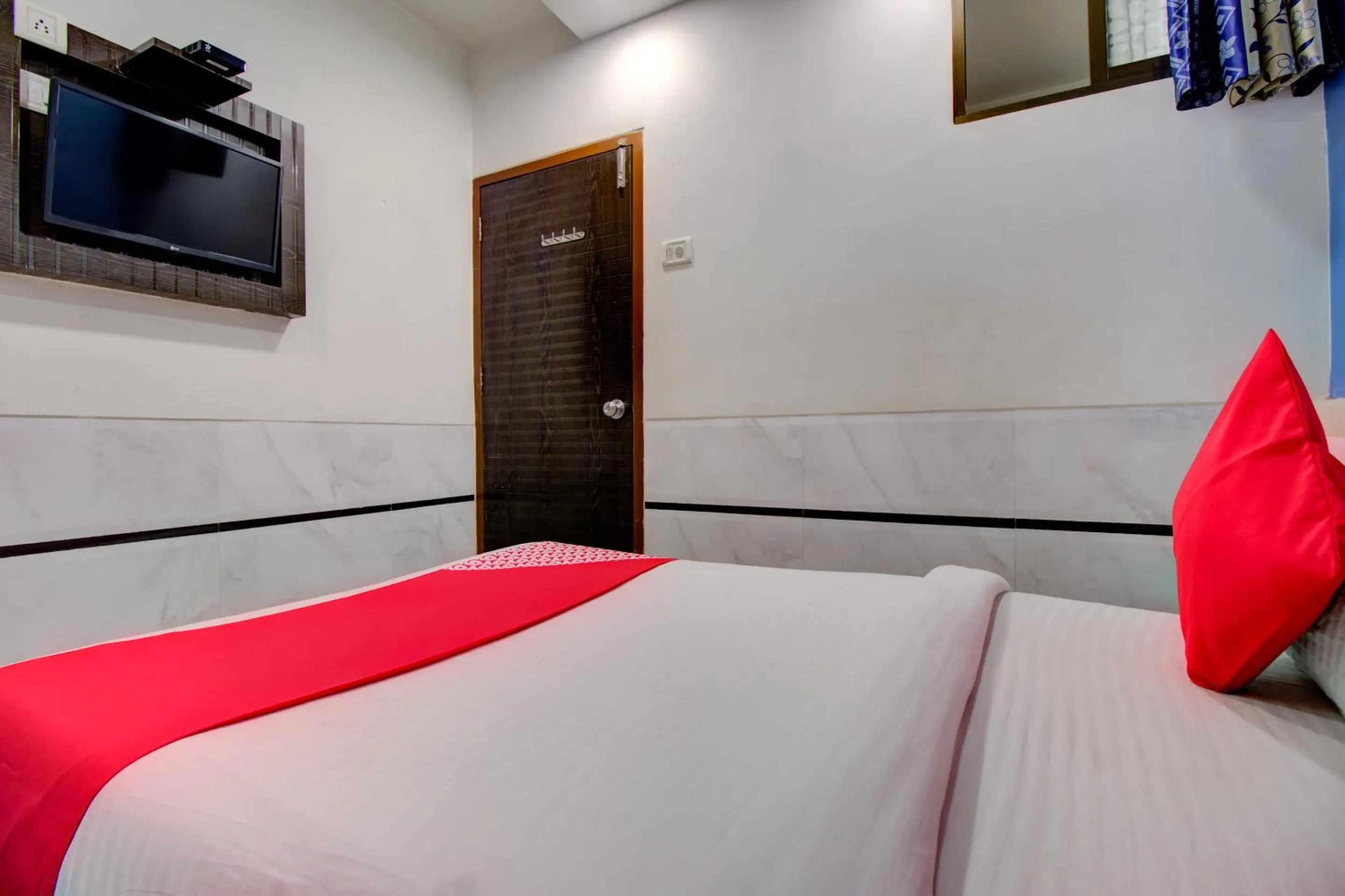 Bedroom in Hotel O Sion Residency