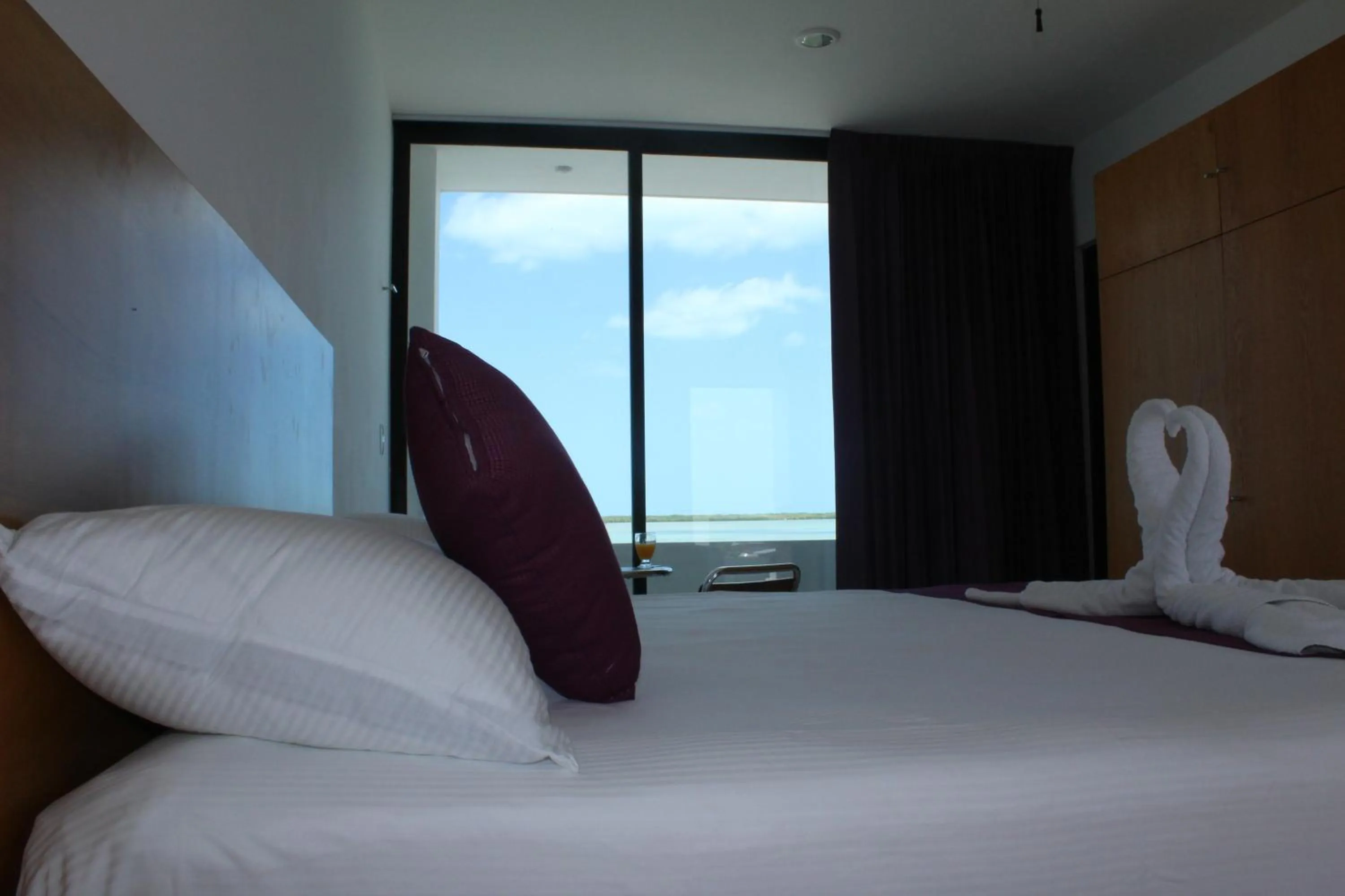 Bed in Yuum Ha Boutique Hotel