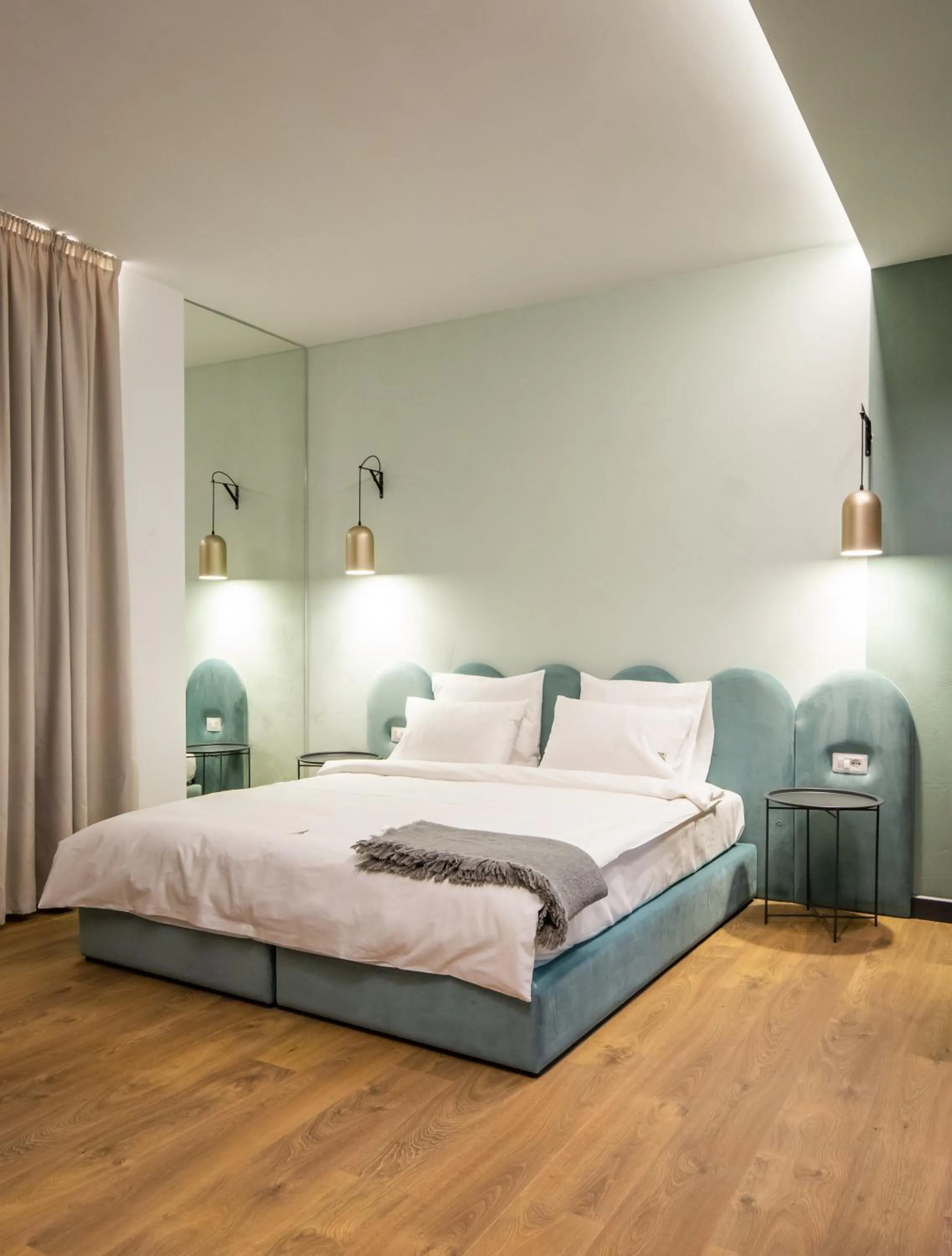 Bed in Allure Boutique Hotel