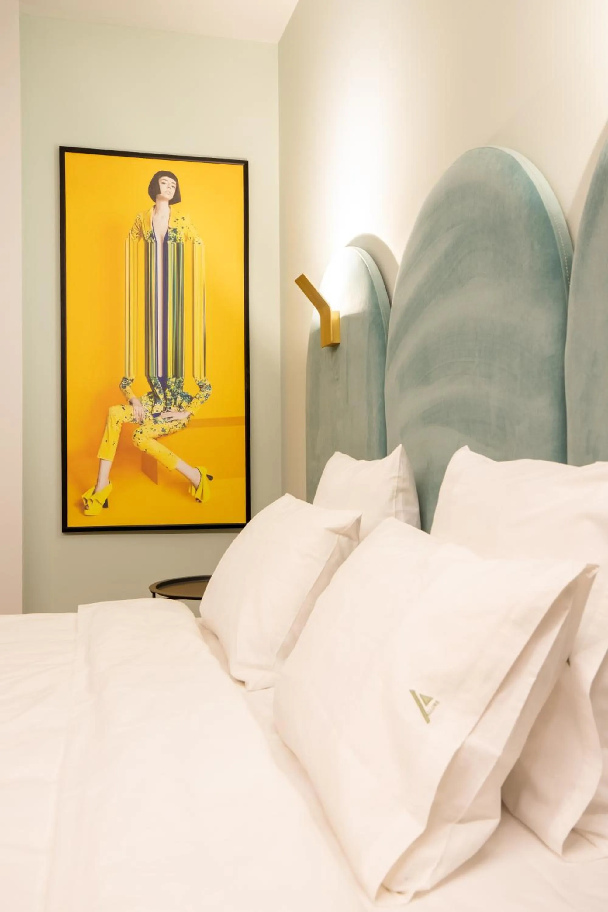 Bed in Allure Boutique Hotel