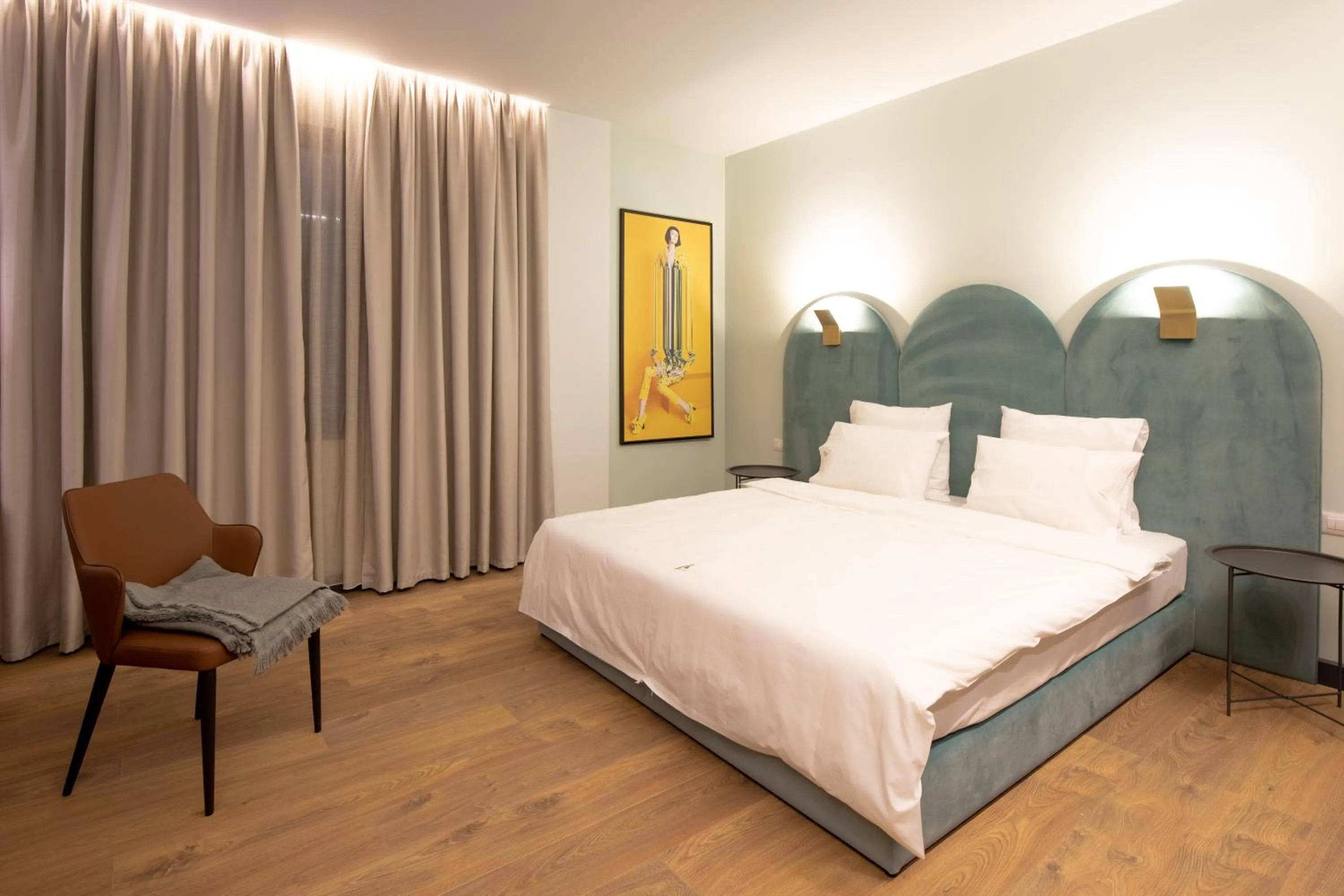 Bed in Allure Boutique Hotel