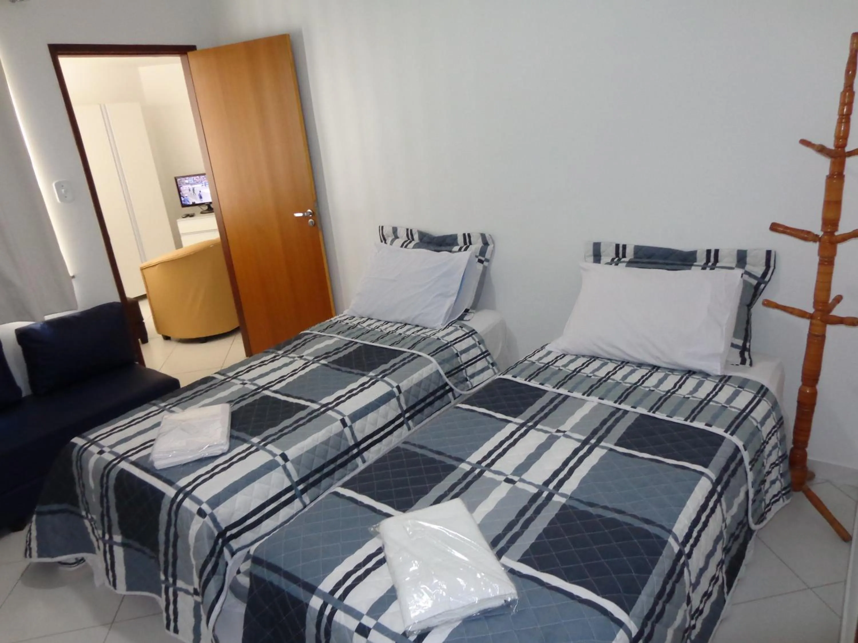 Communal lounge/ TV room, Bed in Luz & Mar