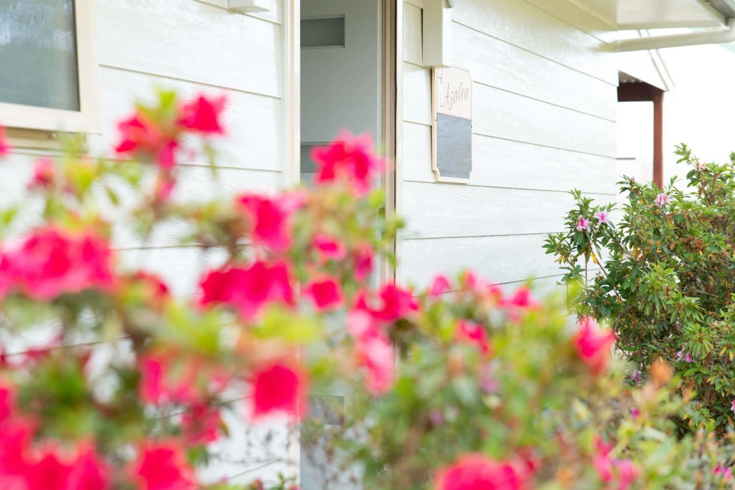 Facade/entrance in Poinciana Cottages