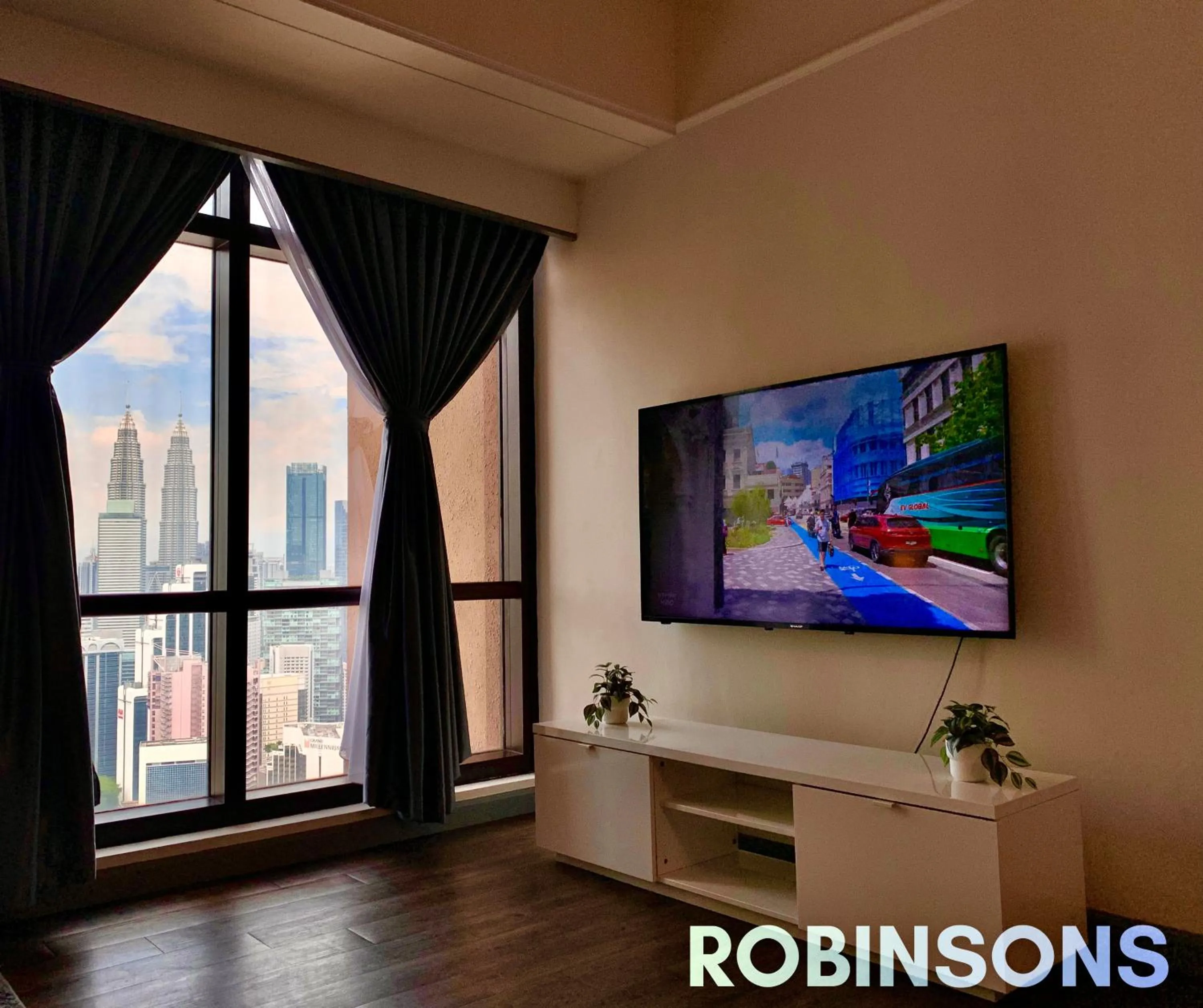 Communal lounge/ TV room in Serviced Apartments at Times Square Kuala Lumpur by Robinsons