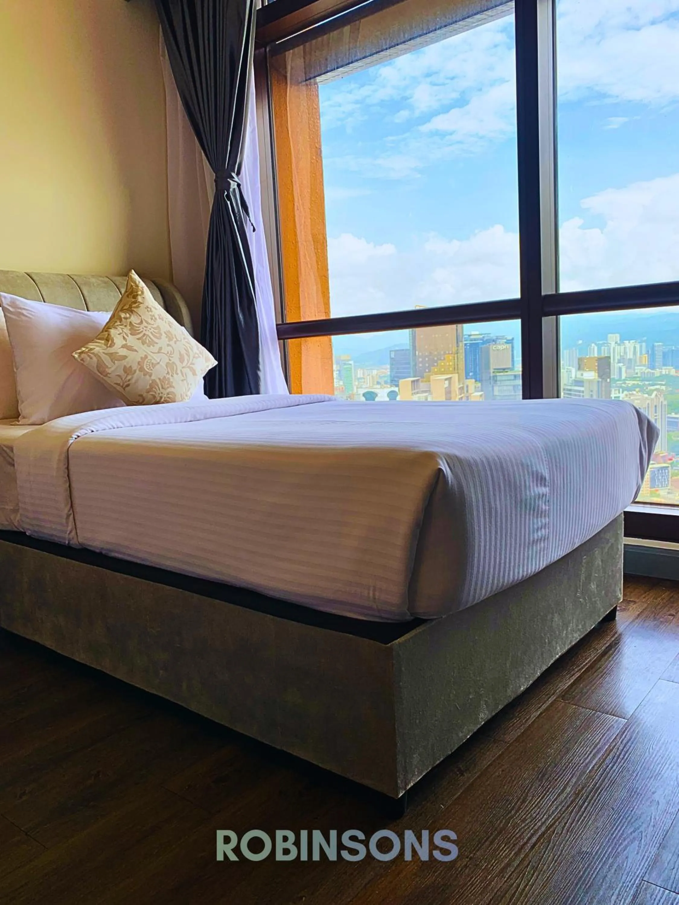 Bed in Serviced Apartments at Times Square Kuala Lumpur by Robinsons