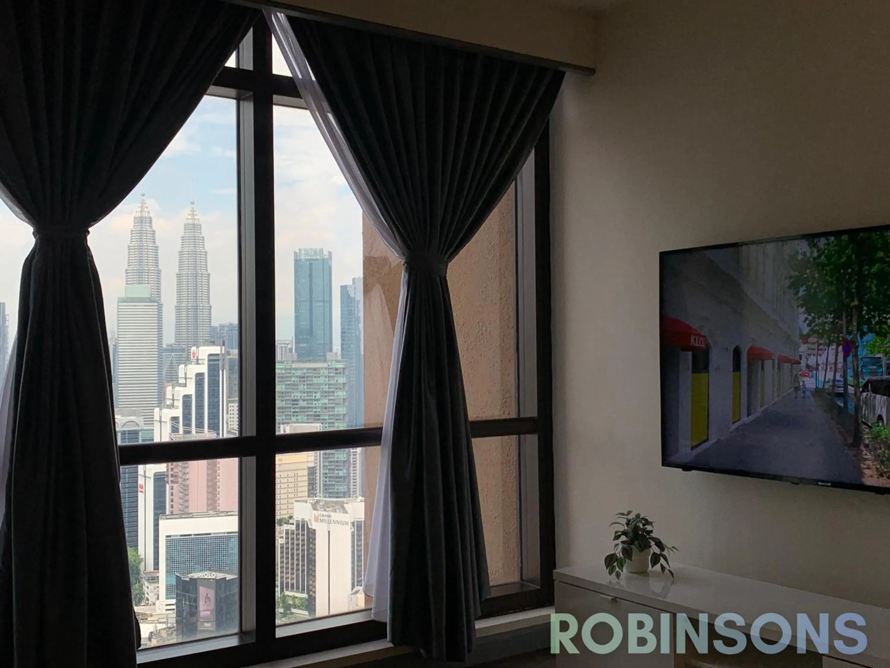 Communal lounge/ TV room in Serviced Apartments at Times Square Kuala Lumpur by Robinsons