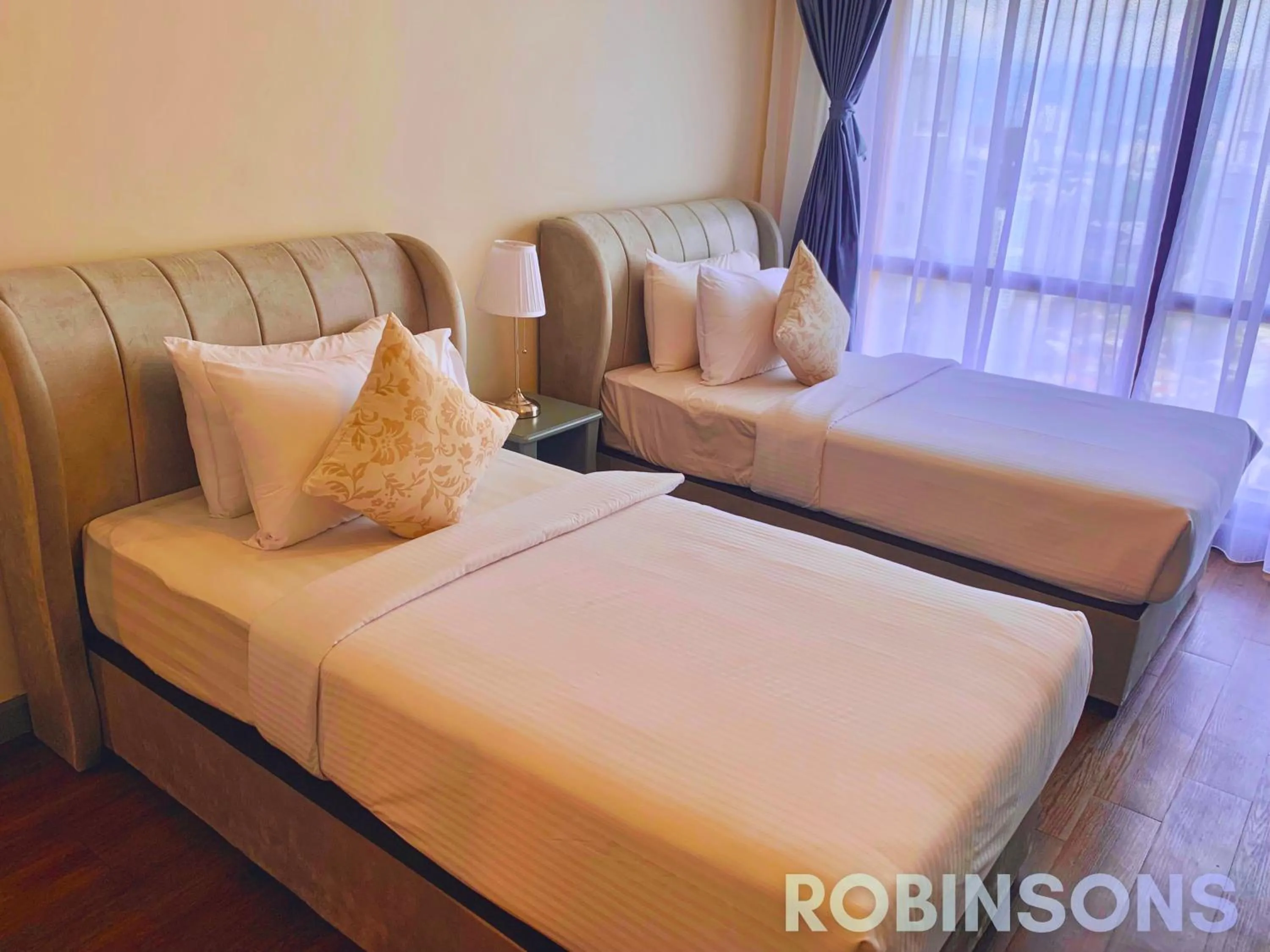 Bed in Serviced Apartments at Times Square Kuala Lumpur by Robinsons