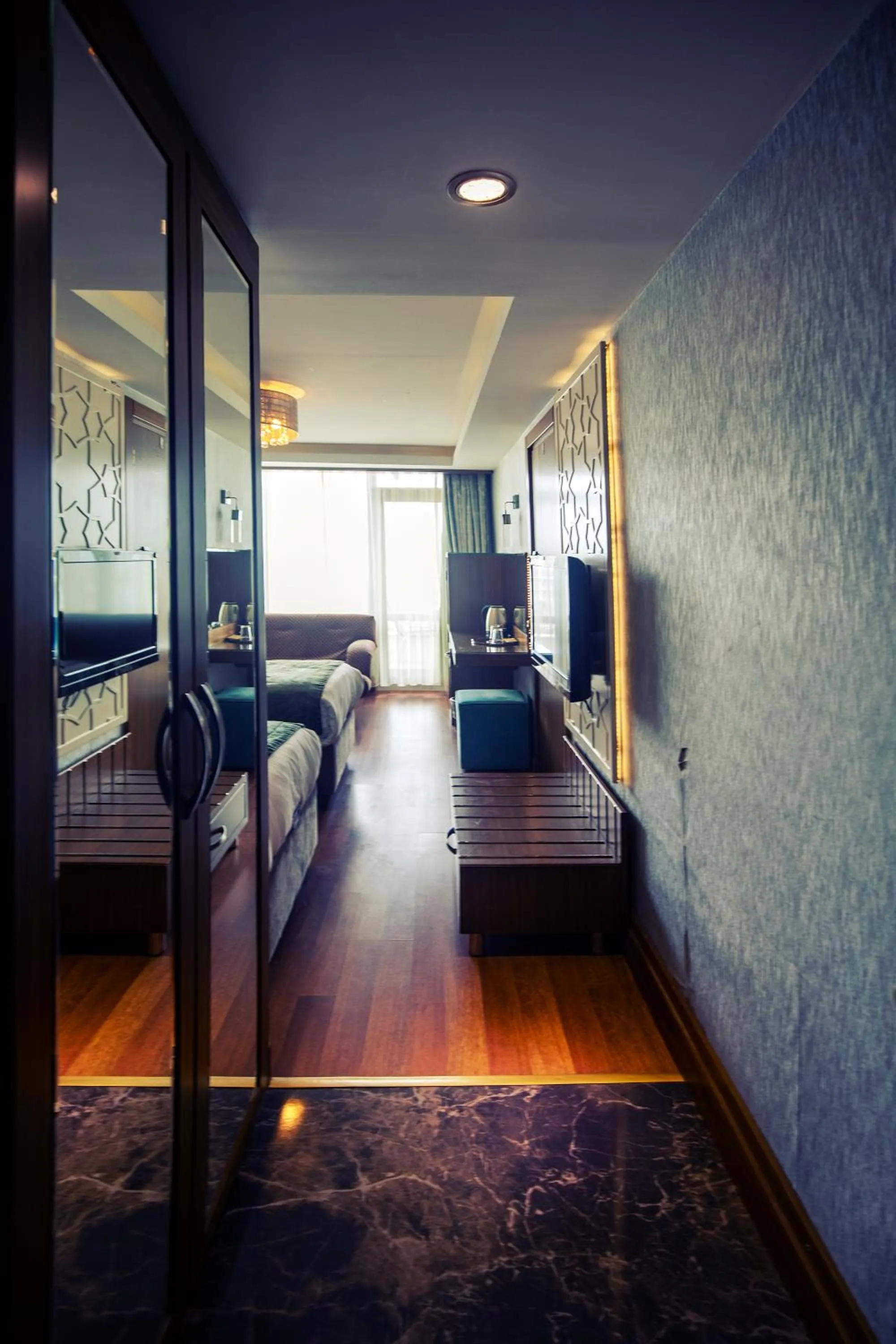 Communal lounge/ TV room, Bed in Grand Star Hotel Premium