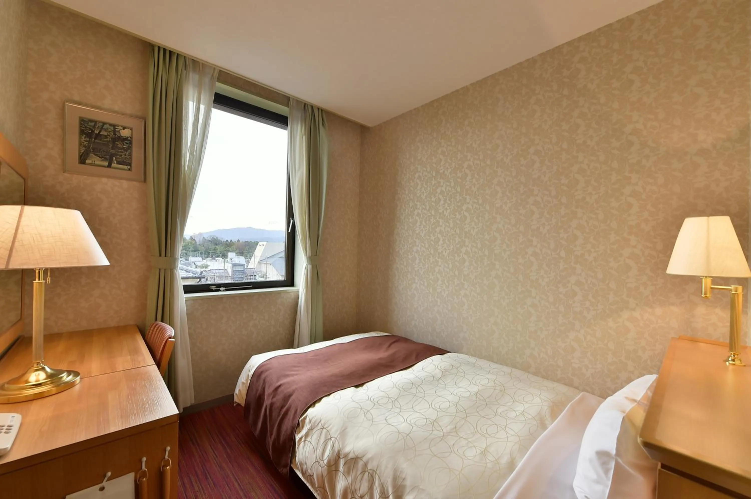 Bed in KKR Kyoto Kuniso