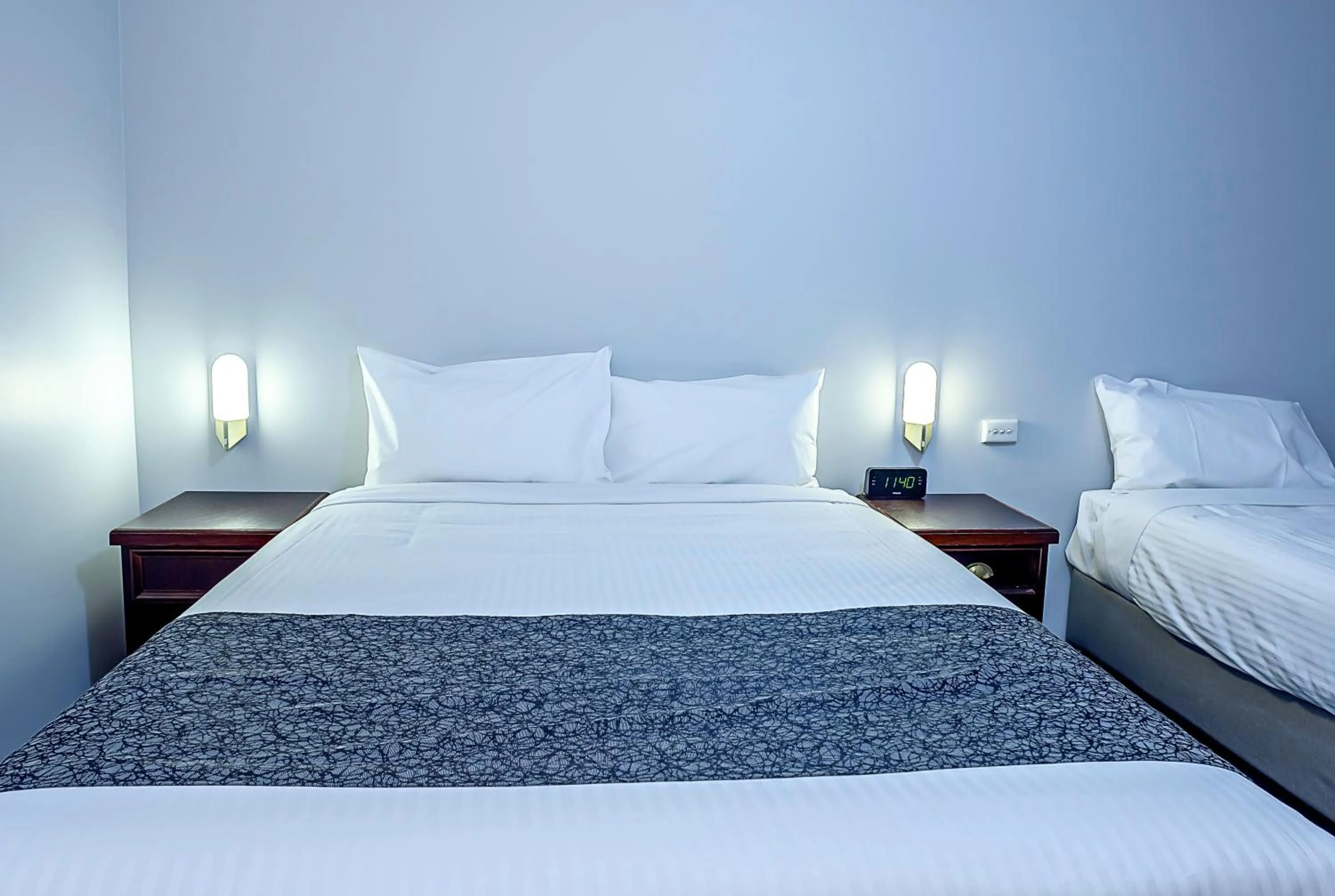 Bed in Bushman's Motor Inn