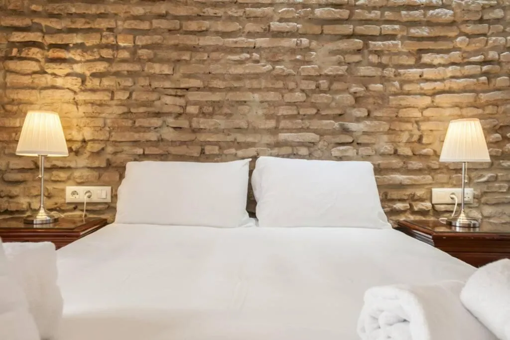 Bed in PuraSevilla apartments