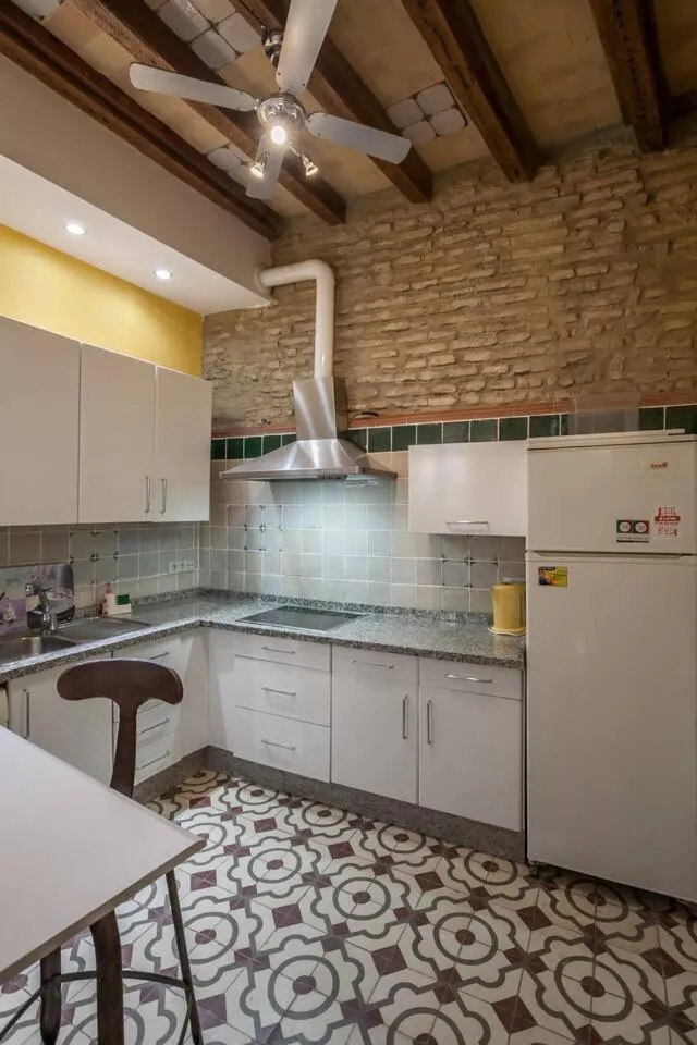 Kitchen or kitchenette in PuraSevilla apartments