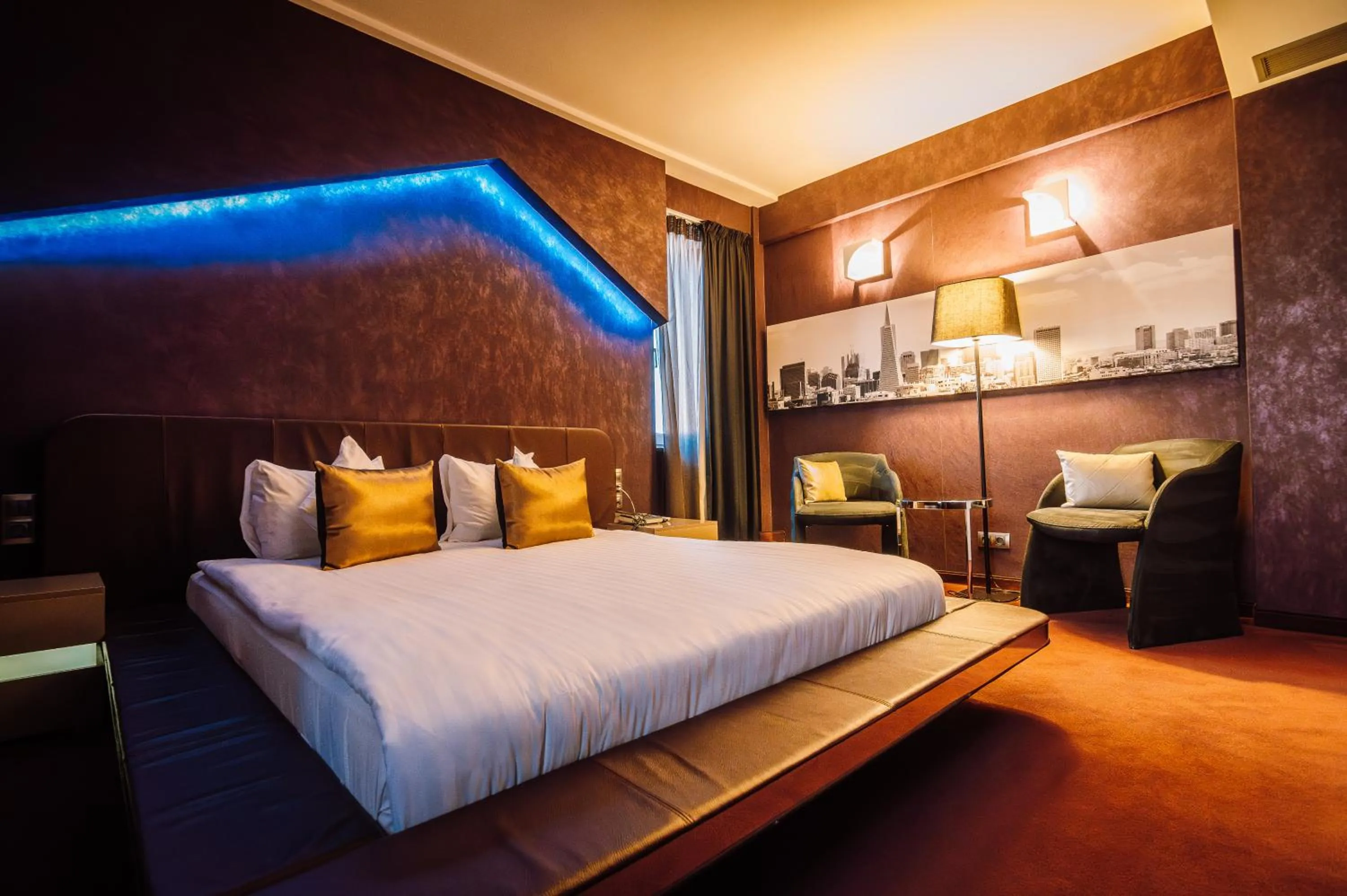 Bed in Plaza V Executive Hotel