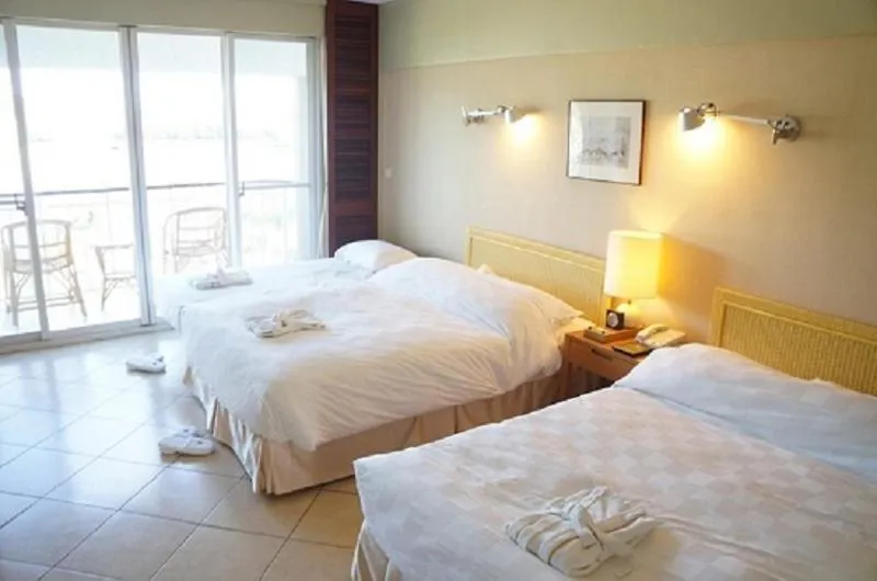 Bed in Palau Royal Resort