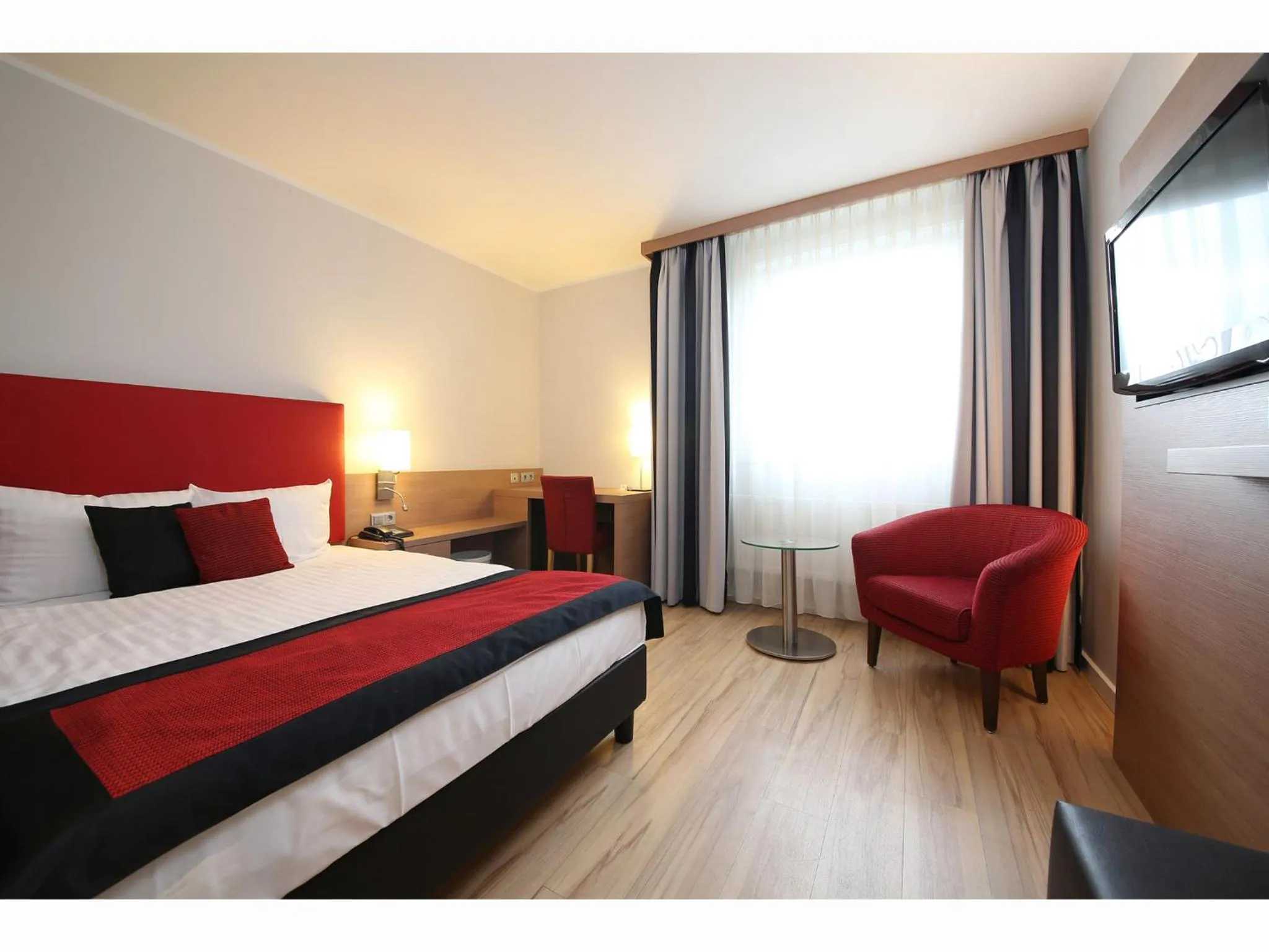 Photo of the whole room, Bed in Congress Hotel am Stadtpark