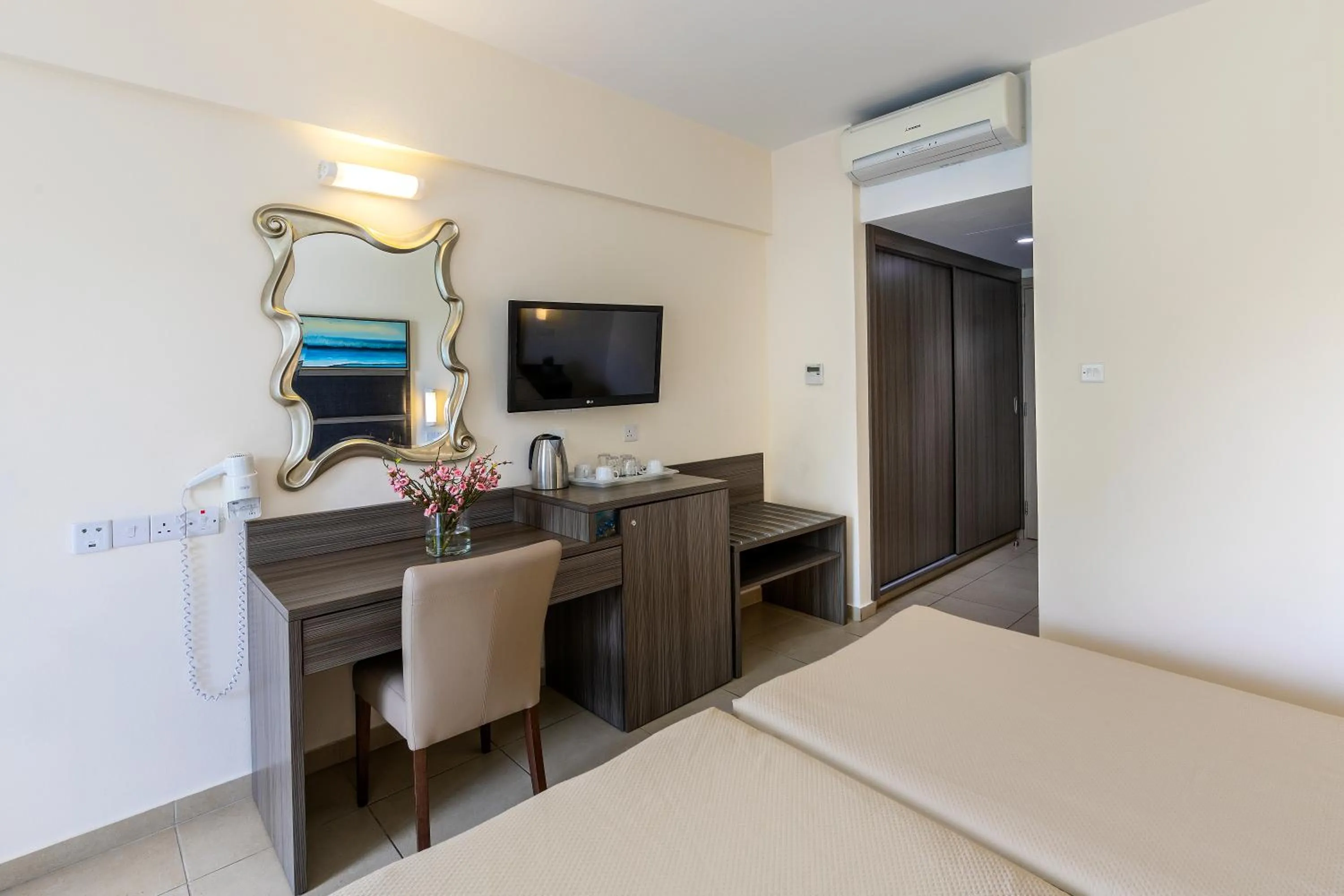 Bed in Tofinis Hotel