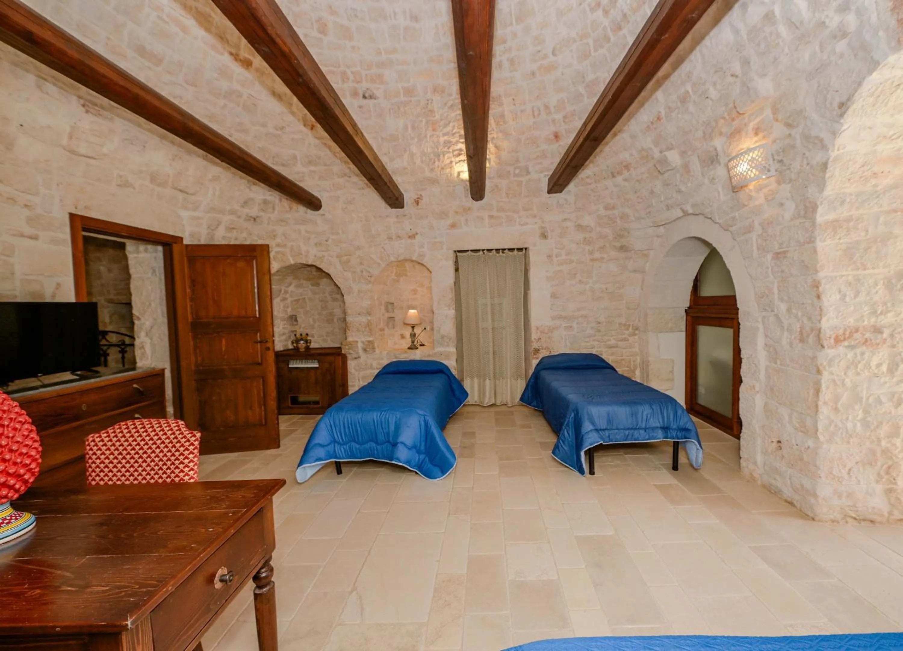 Living room, Bed in Resort Masseria Cecato