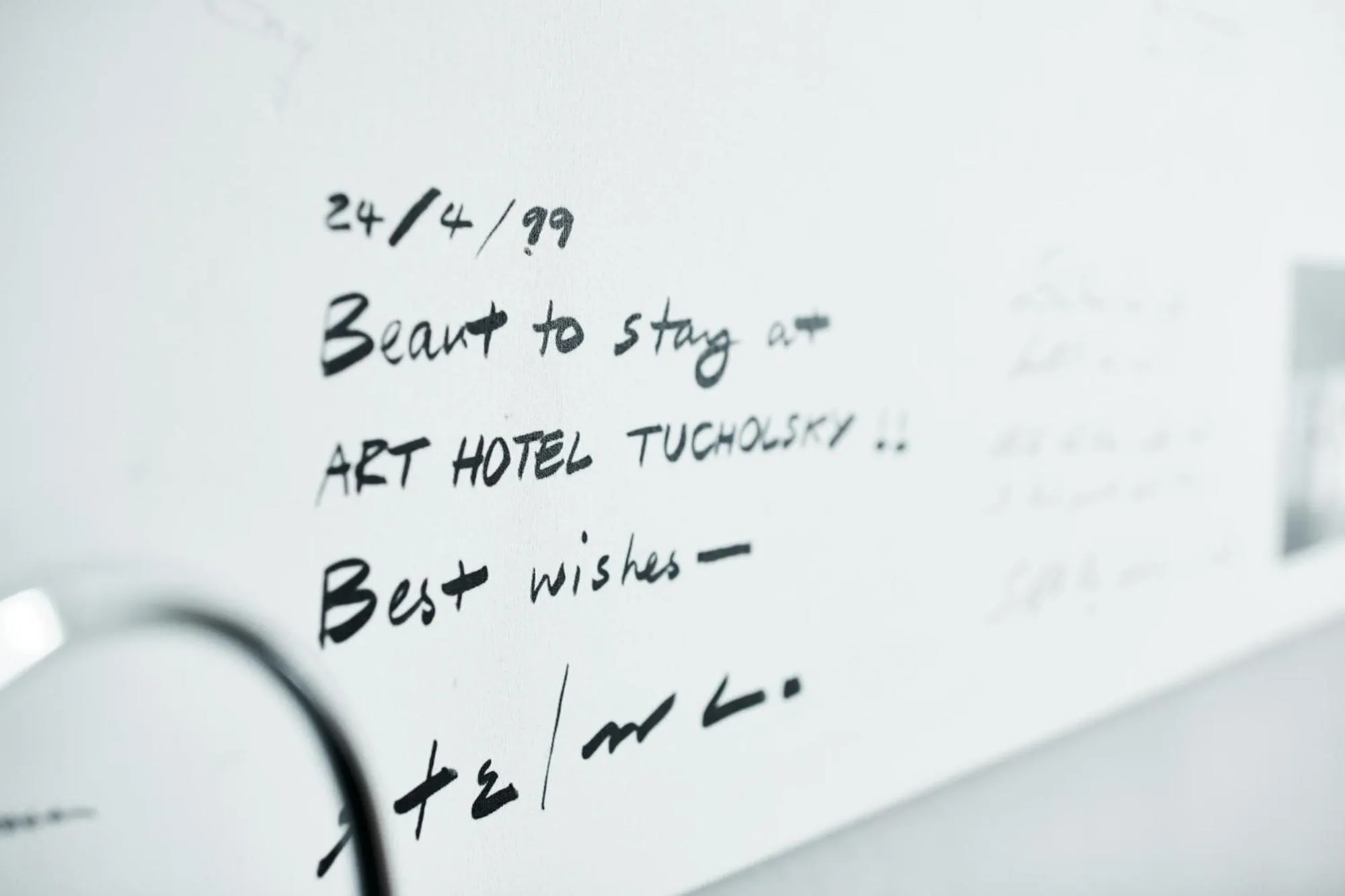 Text overlay in art Hotel Tucholsky