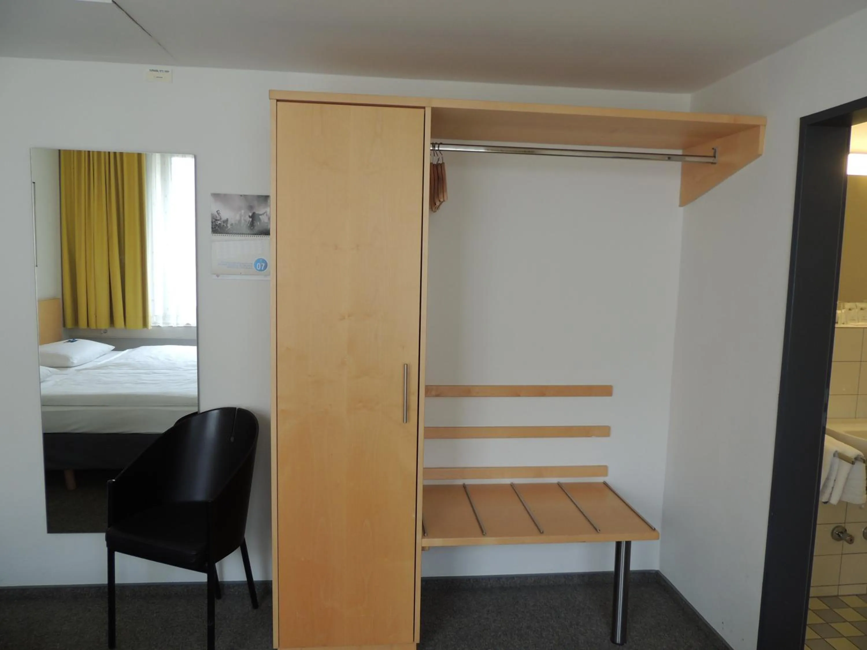 Photo of the whole room, Bed in CVJM Düsseldorf Hotel & Tagung